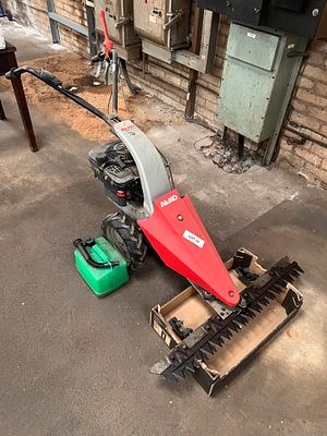 An ALKO BM 875 self propelled petrol scythe.