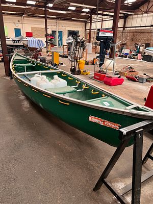 A Colman 15 Canadian canoe complete with paddles and single seat conversion.
