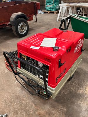 A Penny diesel hot water pressure washer + hoses and lance
