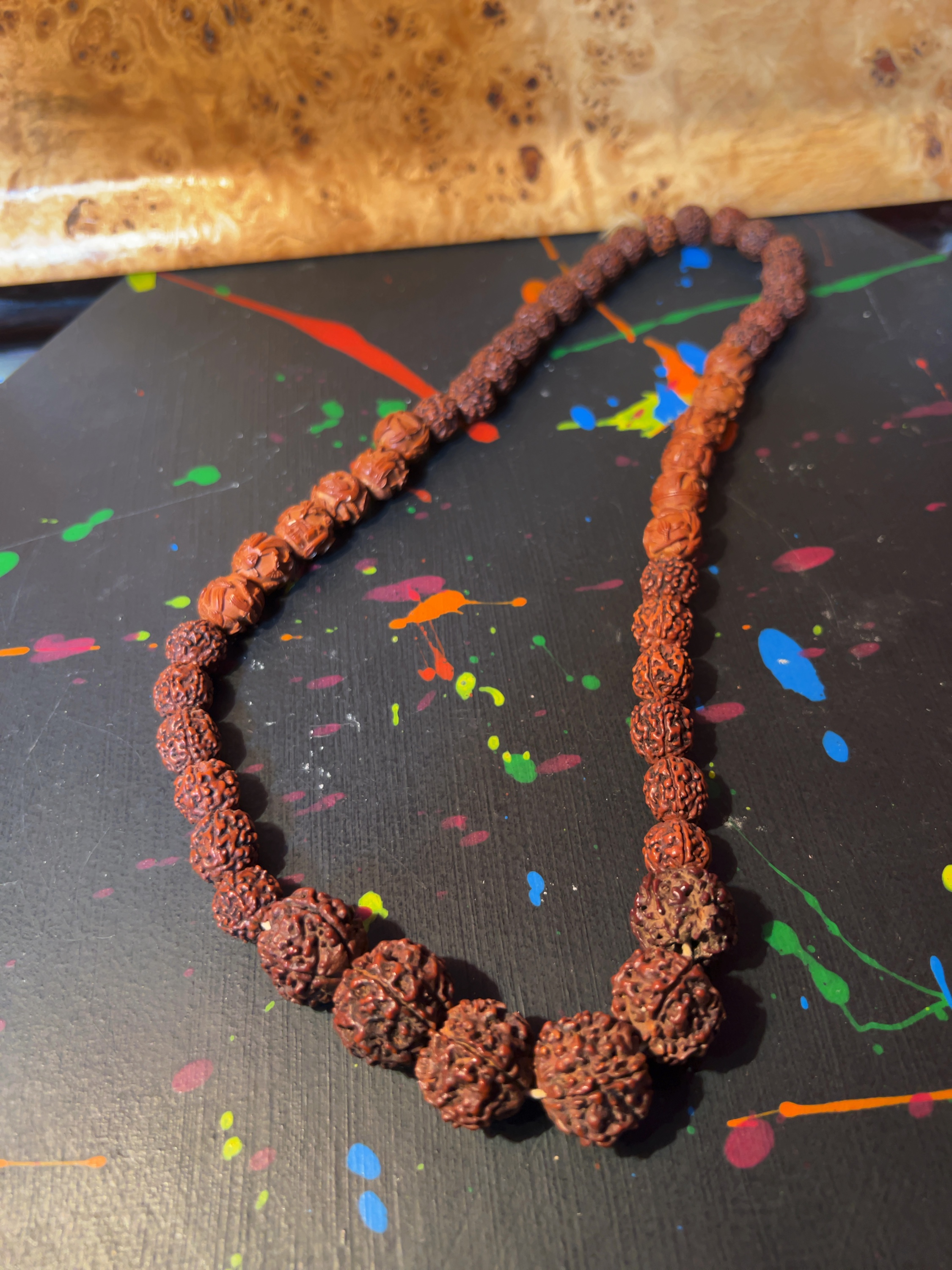 A Chinese Carved Beetle Nut and Rudraksha Seed Mala Necklace