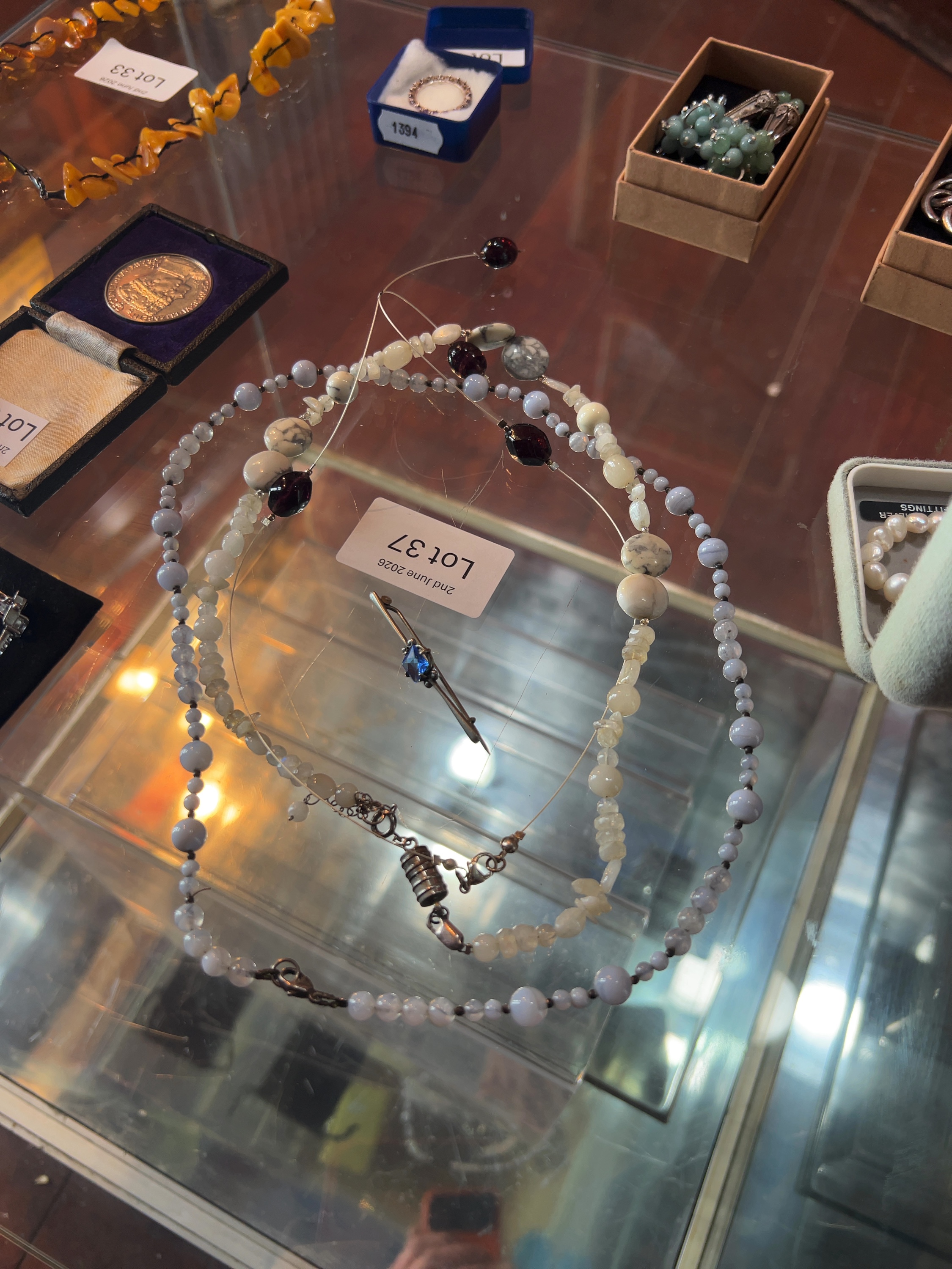 A Collection of Gemstone and Pearl Jewellery with Silver Clasps