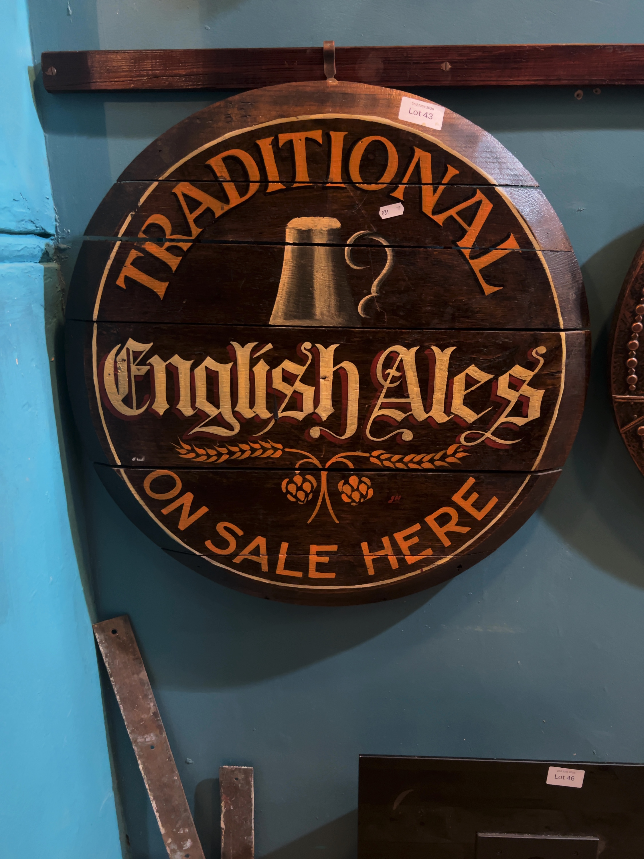 A Plum and Co Traditional English Ales barrel-end pub sign