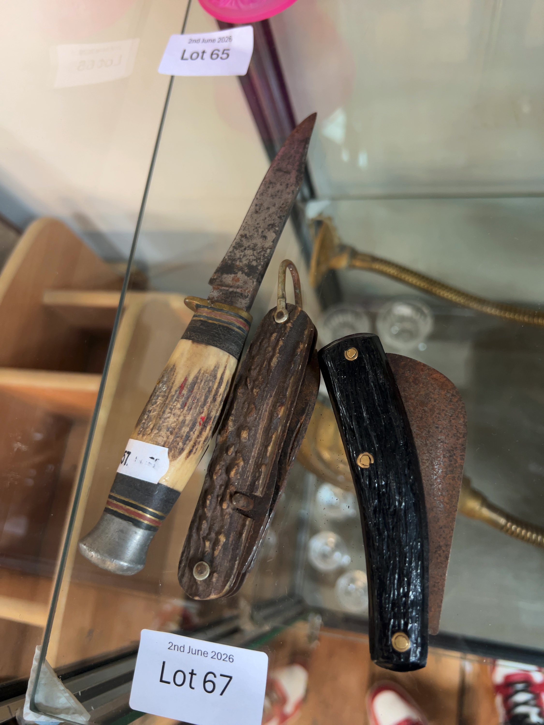 A Trio of Vintage Sheffield Knives including a William Rodgers Hunting Knife and Two Folding Pocket Knives