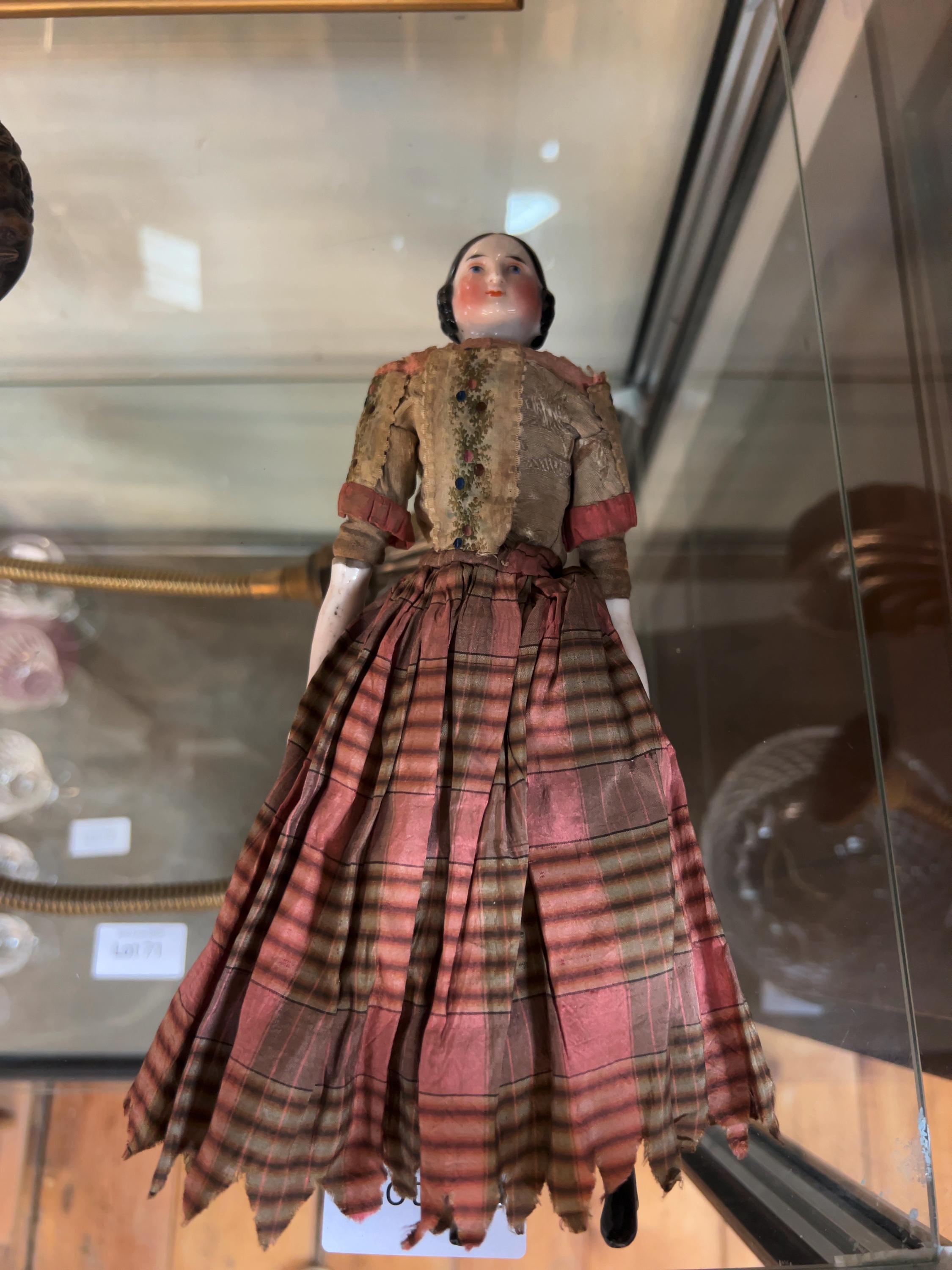 An Antique Glazed China Shoulder-Head Doll
