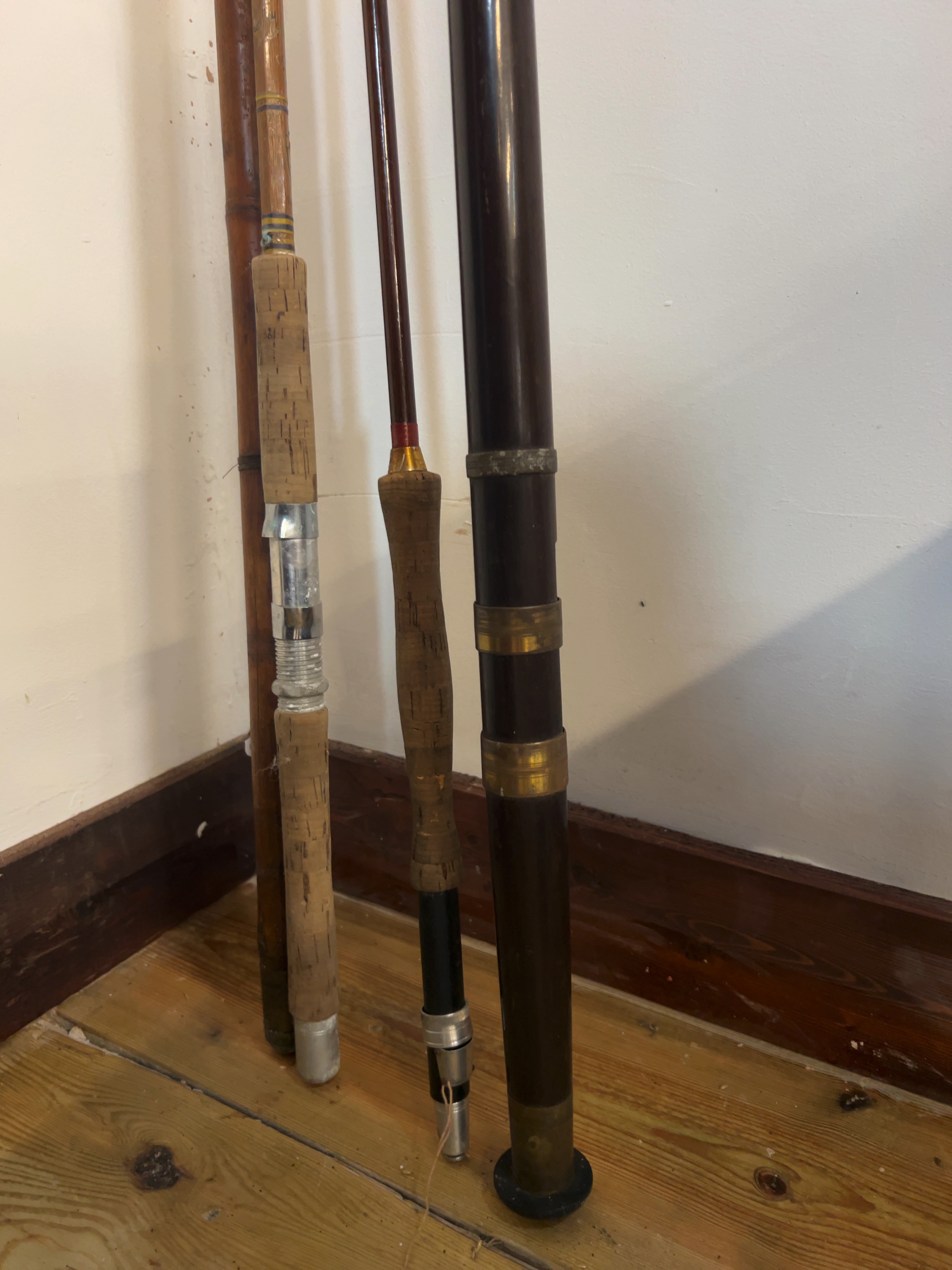 A Collection of Vintage Bamboo and Split Cane Fishing Rods and Accessories