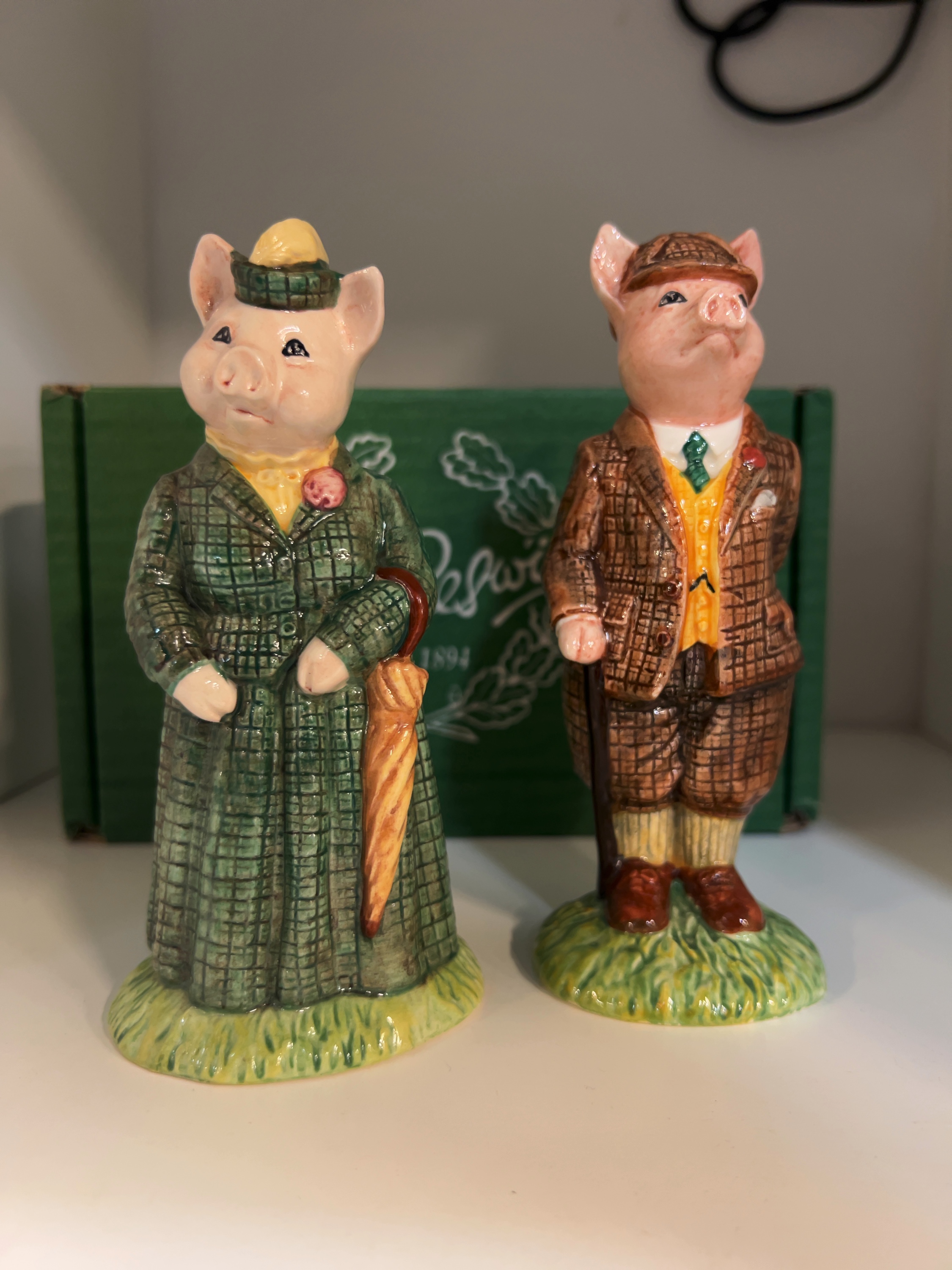 A Pair of Beswick English Country Folk Ceramic Pig Figurines