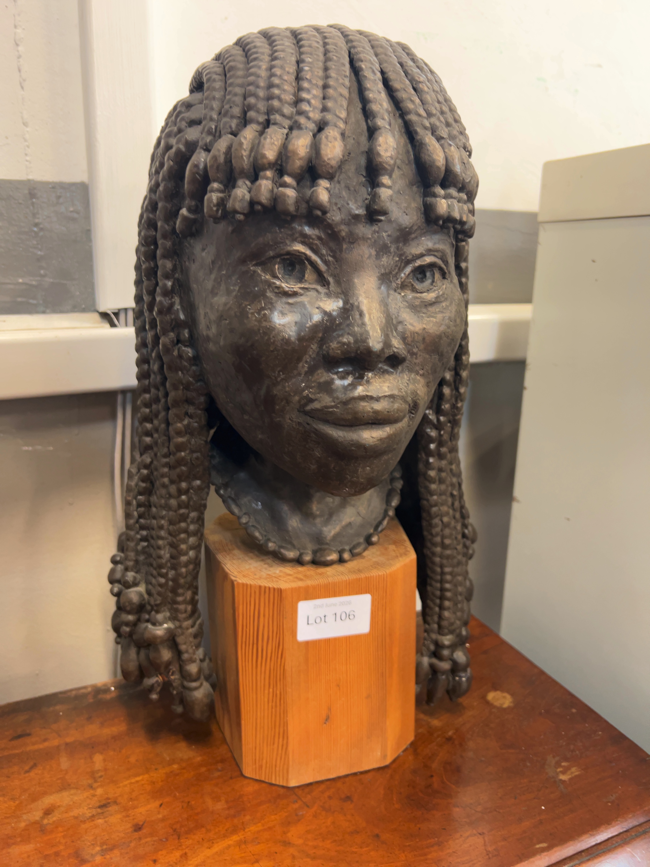A Contemporary Composite Sculptural Bust of an African Woman