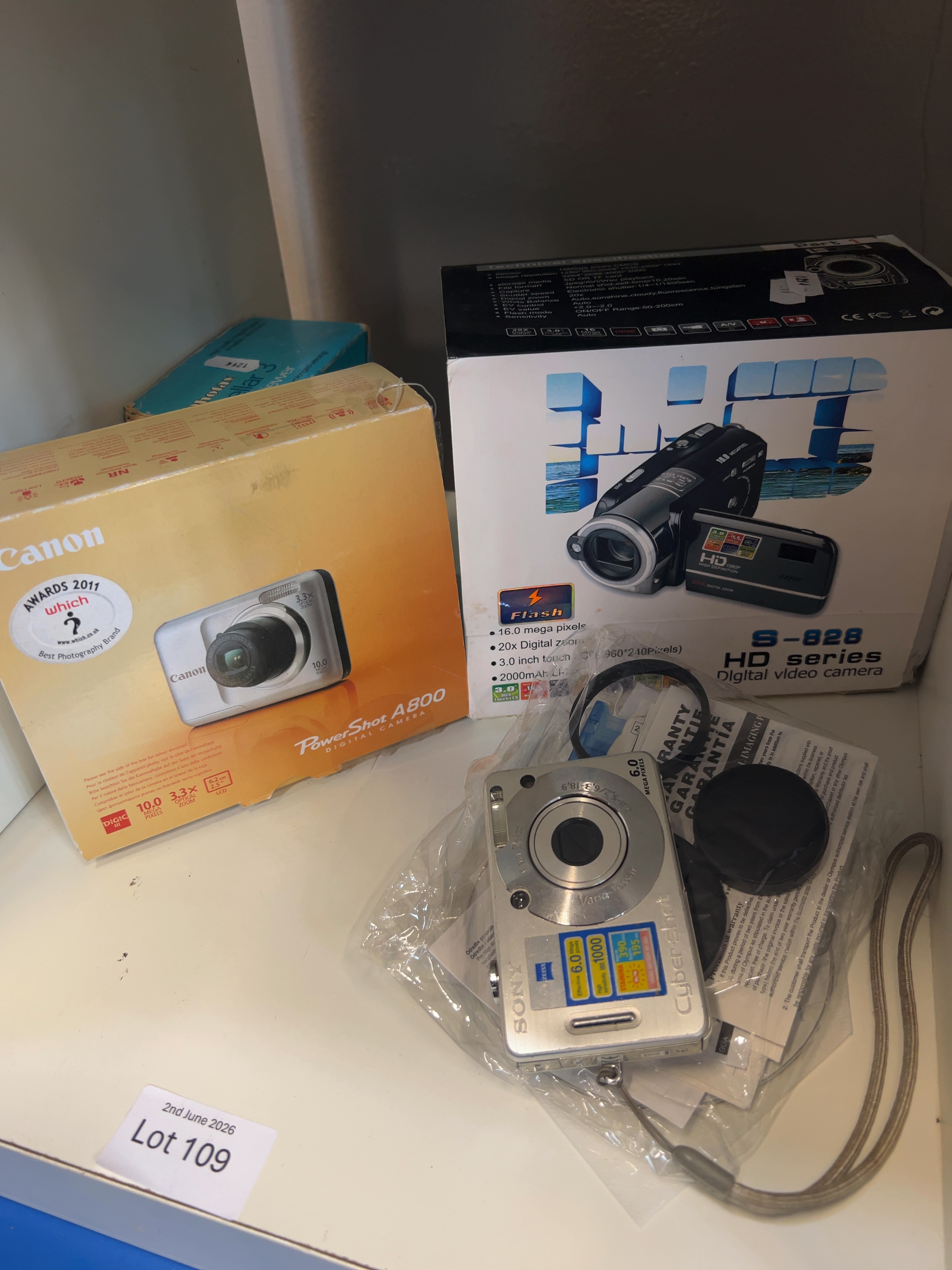 A Trio of Digital Imaging Devices comprising Two Compact Cameras and a Camcorder