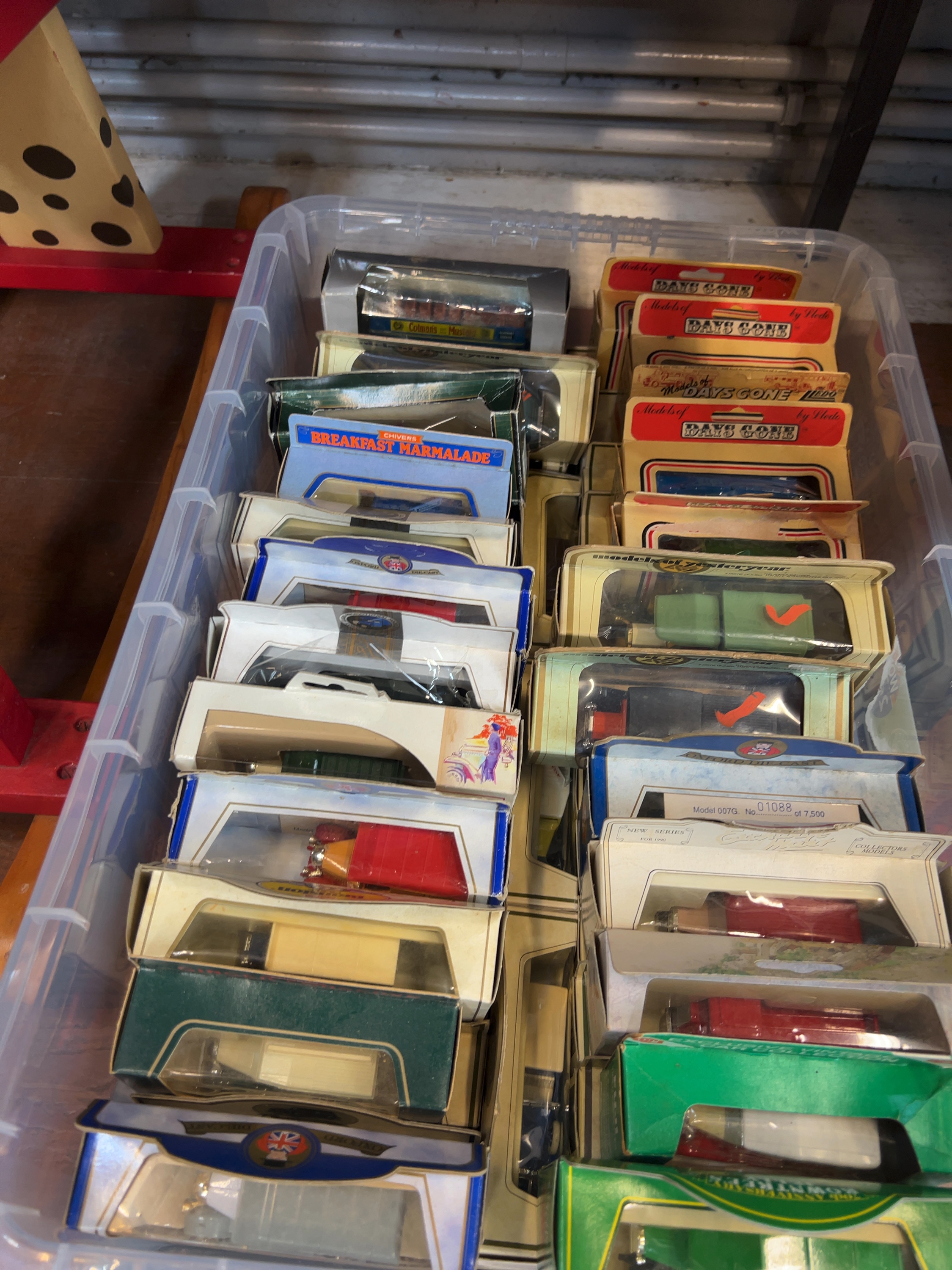 A Large Collection of Boxed Die-cast Model Vehicles by Lledo, Corgi, and Oxford Diecast