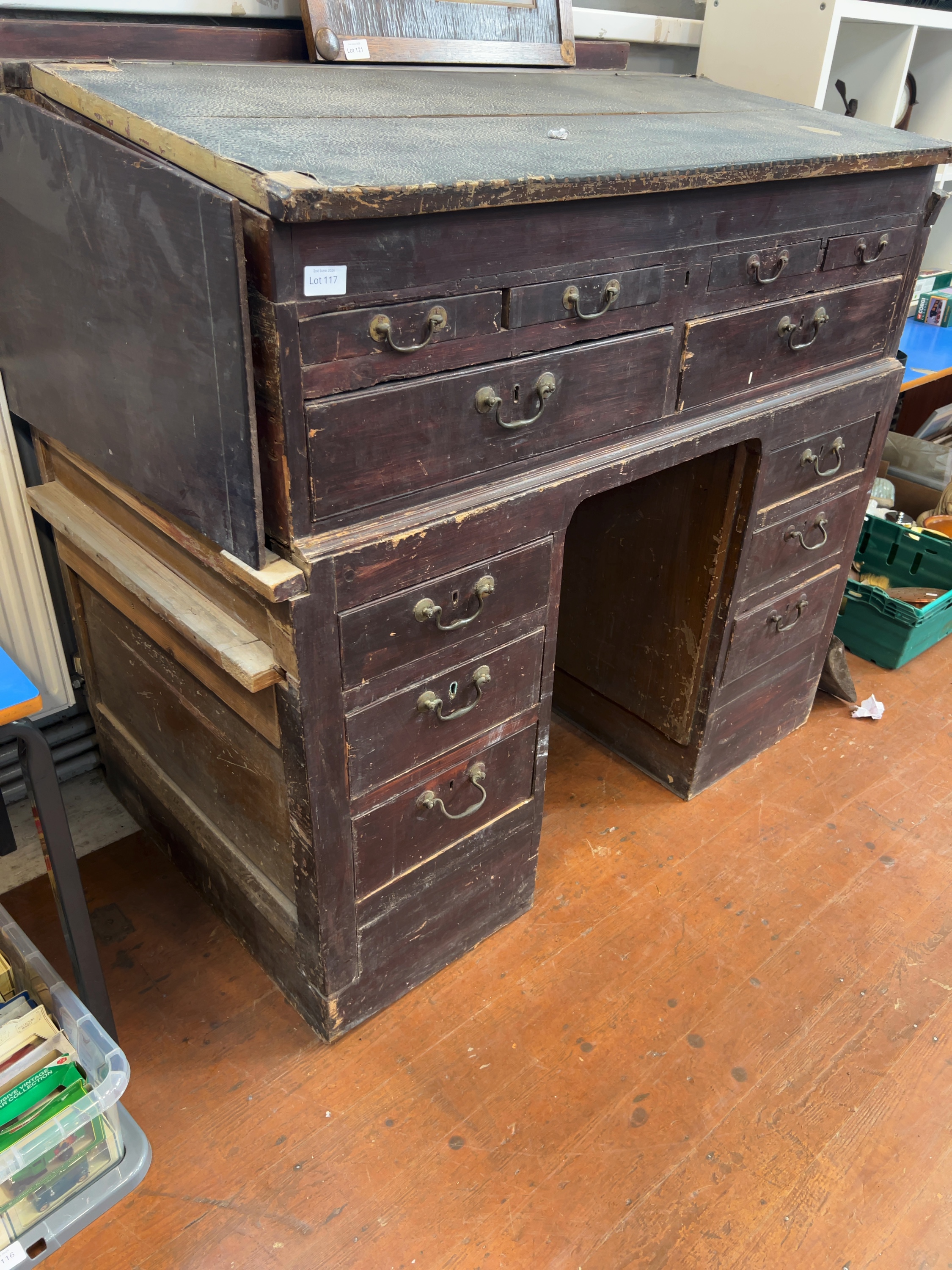 A Victorian stained pine clerk's pedestal desk