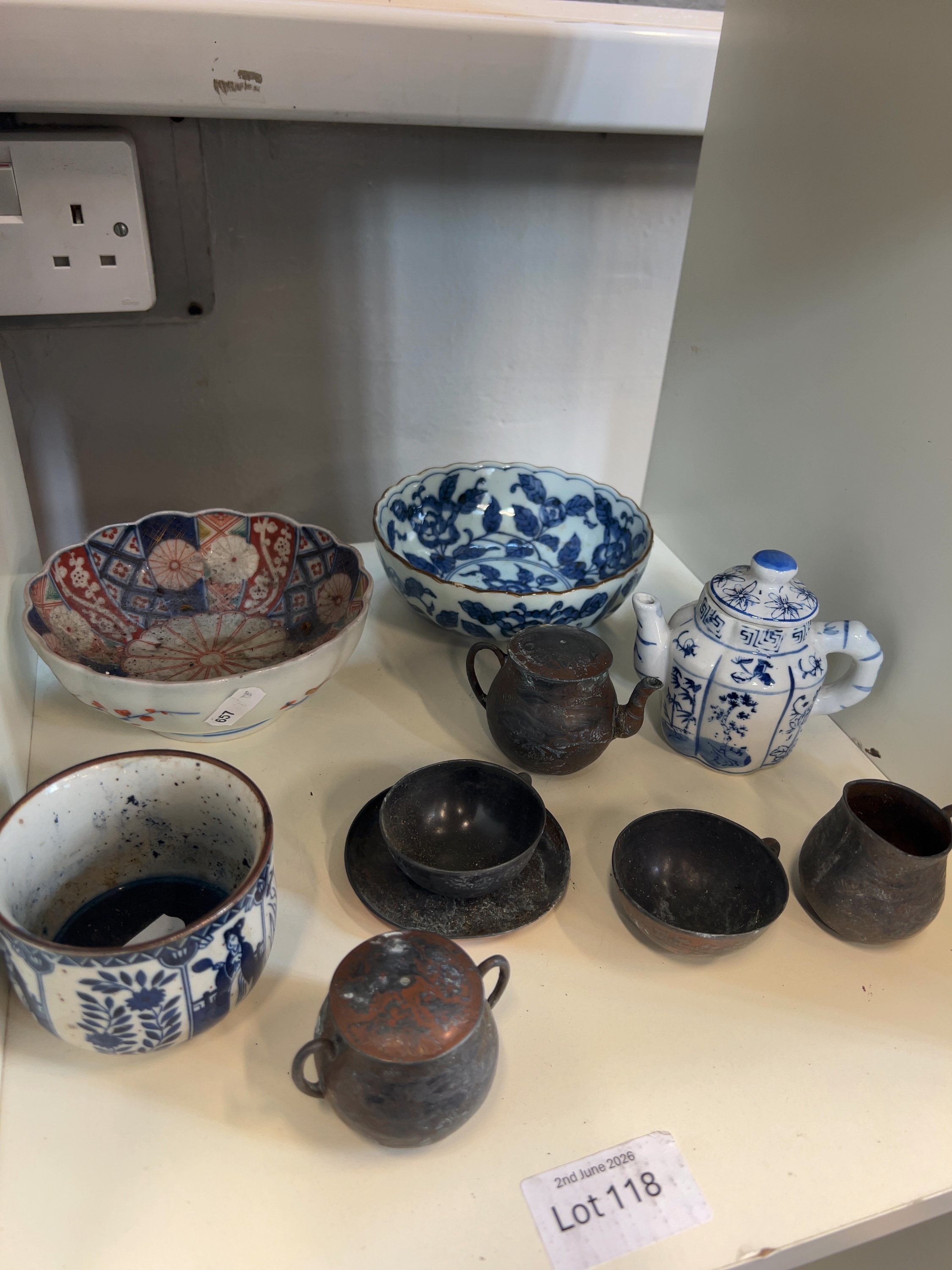 A Collection of Japanese and Chinese Ceramic and Metalware Objects