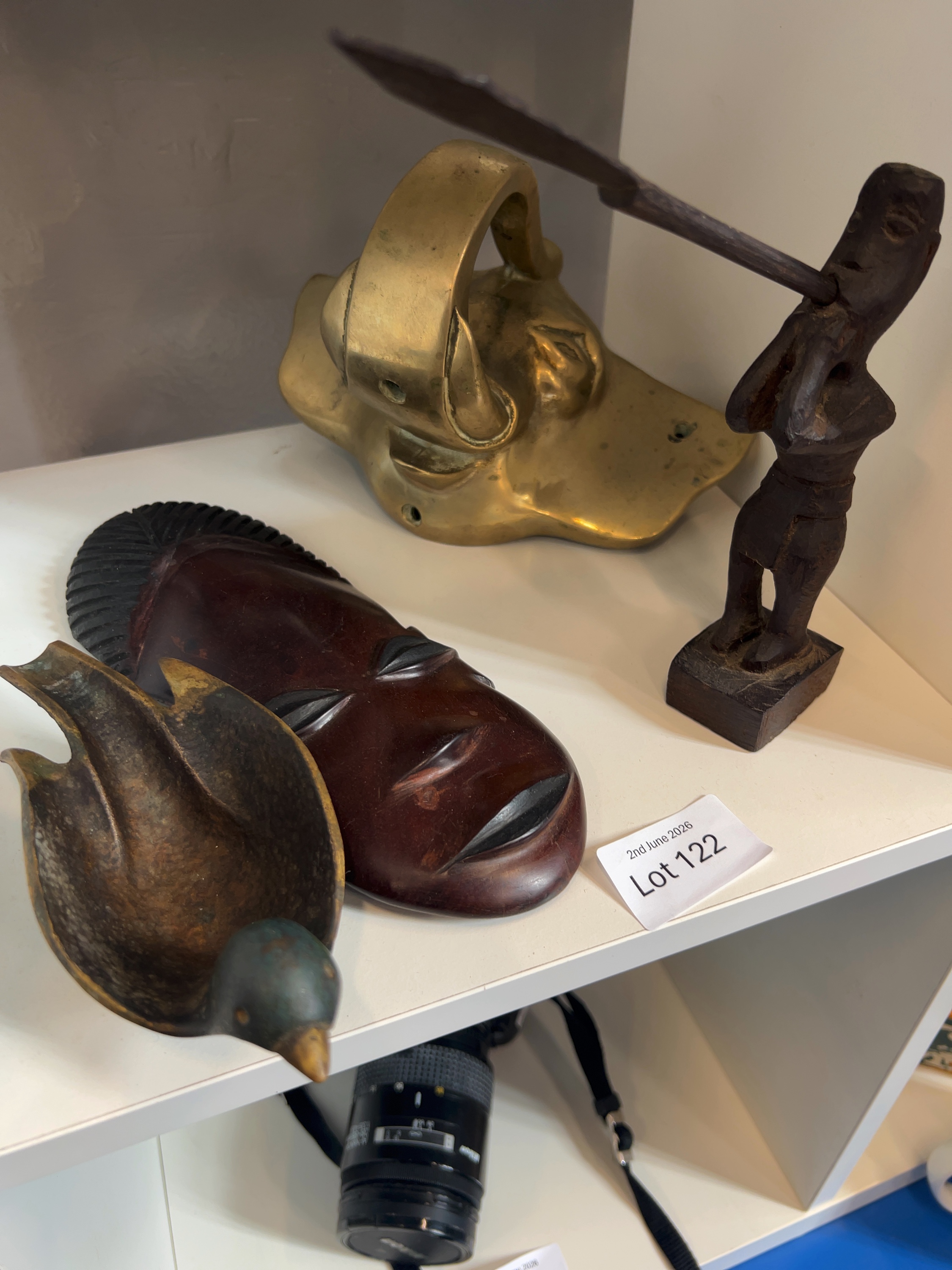 A Collection of Decorative Ethnic-Style Carvings and Metalwork