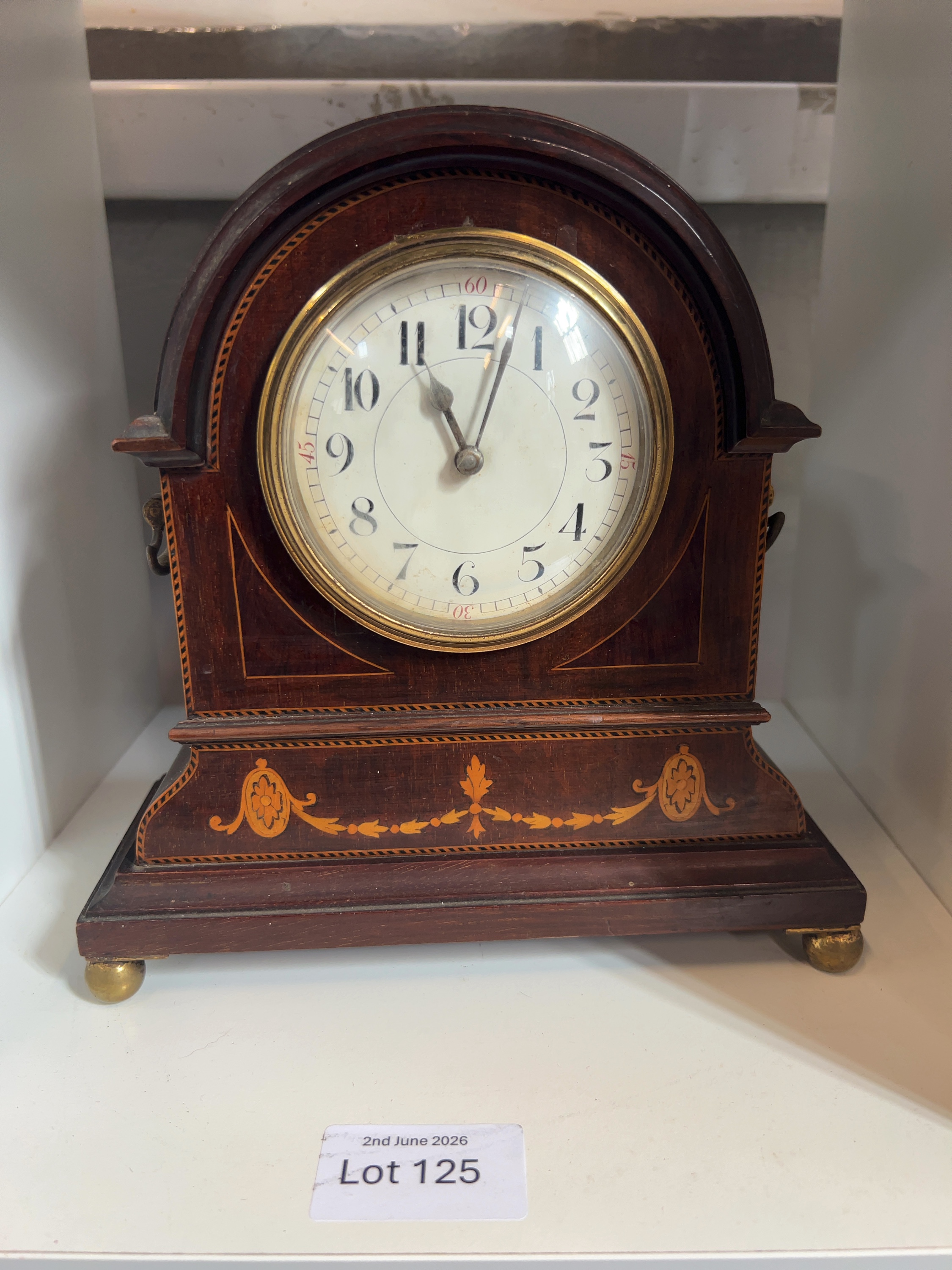 An Edwardian Mahogany and Inlaid Mantle Clock with French Movement