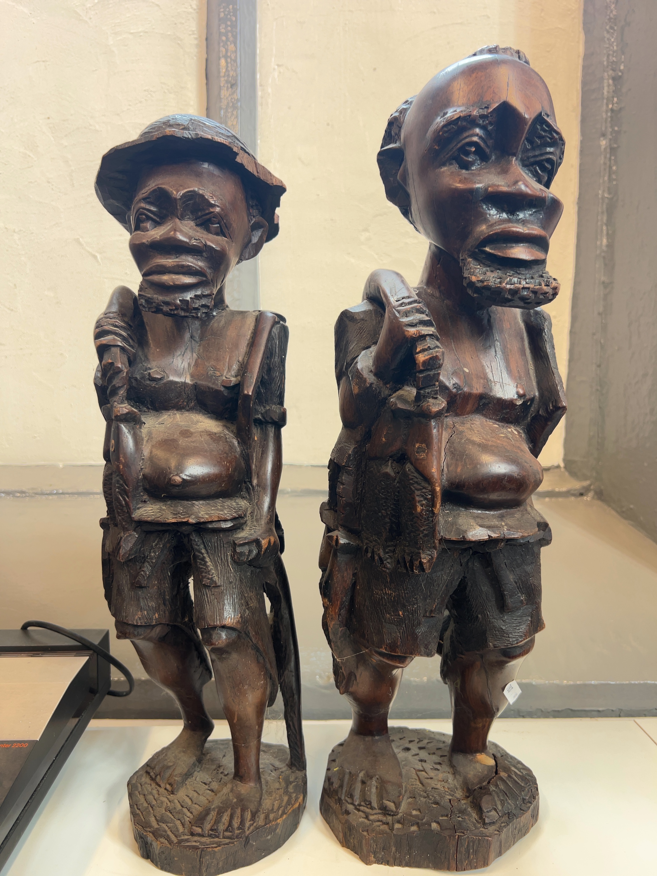 A Pair of Mid-20th Century East African Hand-Carved Hardwood Figures