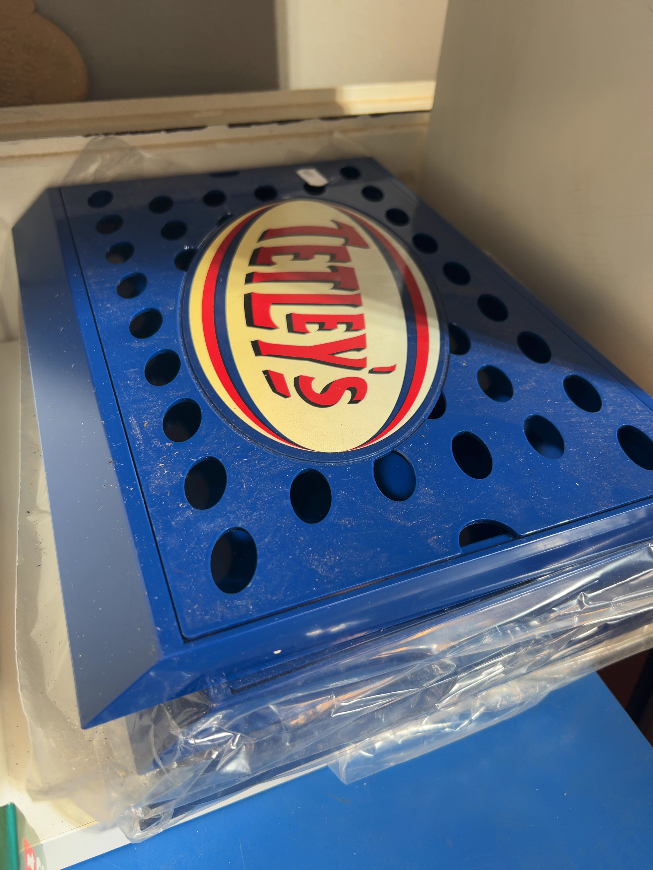 A Group of Tetley's Branded Bar Drip Trays