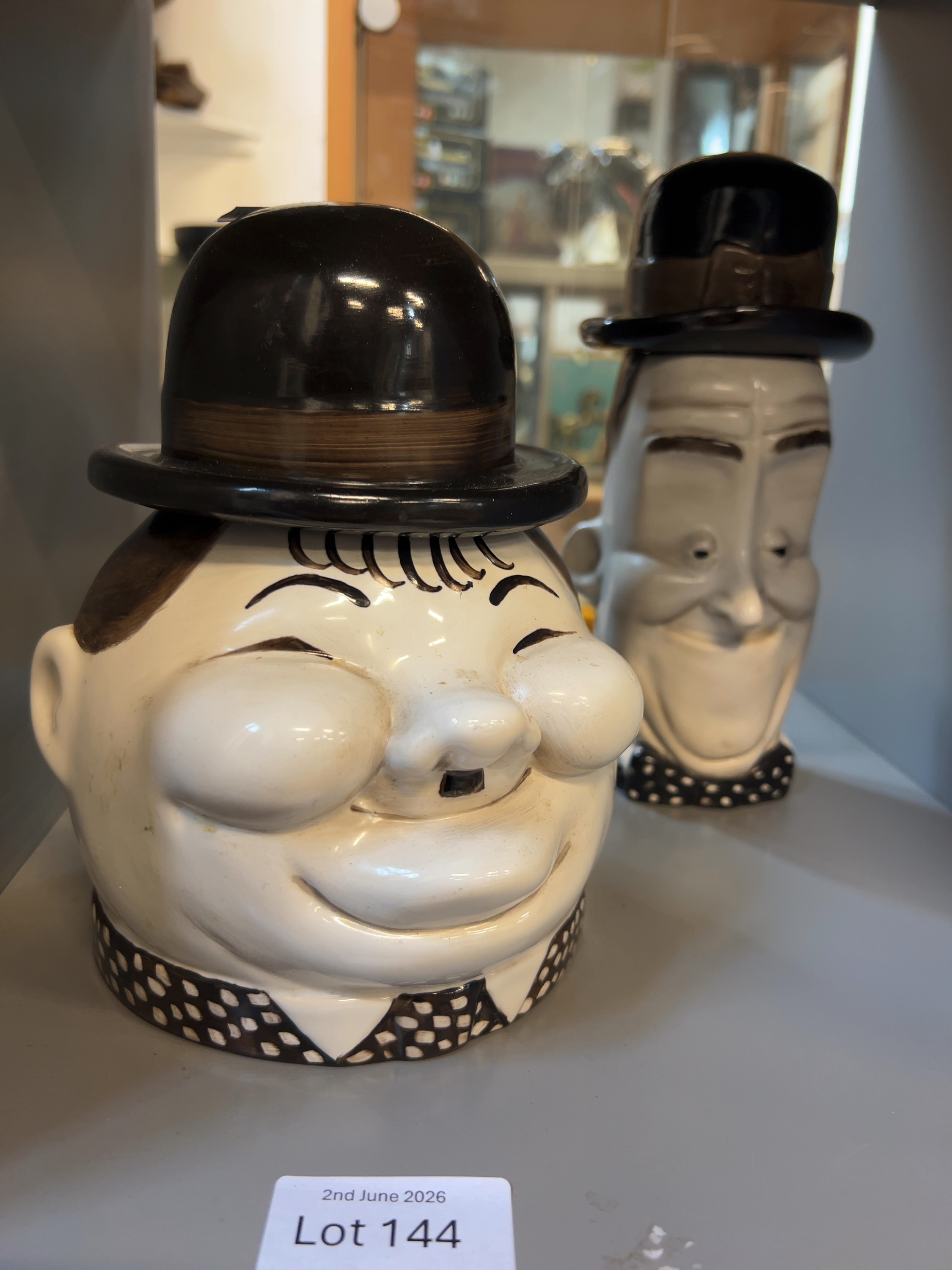 A Pair of Morris Rushton Flesh Pots Ceramic Laurel and Hardy Character Jars