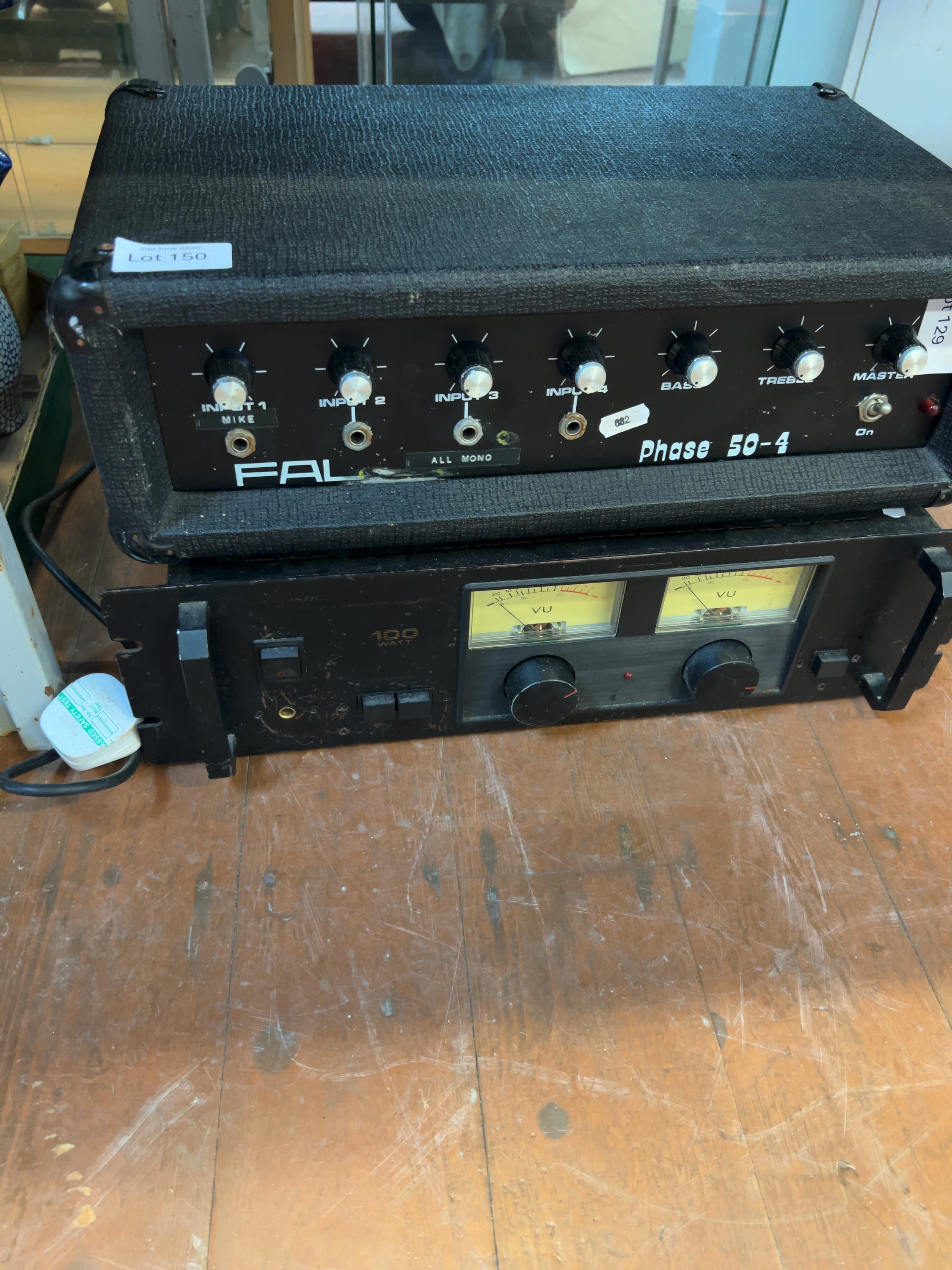 Two items of audio equipment comprising a FAL Phase 50-4 mixer amplifier and a rack-mountable 100 watt power amplifier