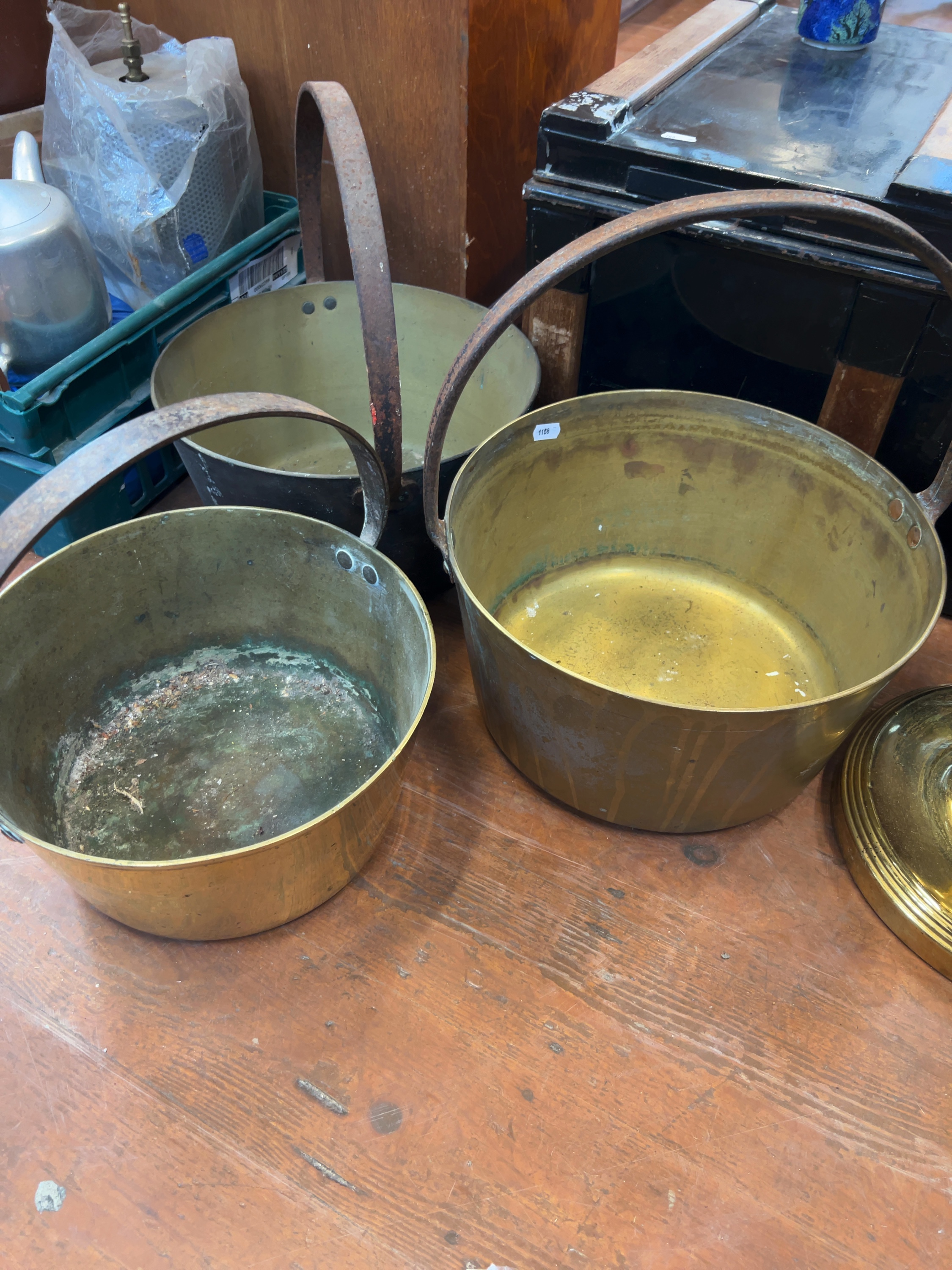 Three Victorian brass preserve pans with wrought iron handles