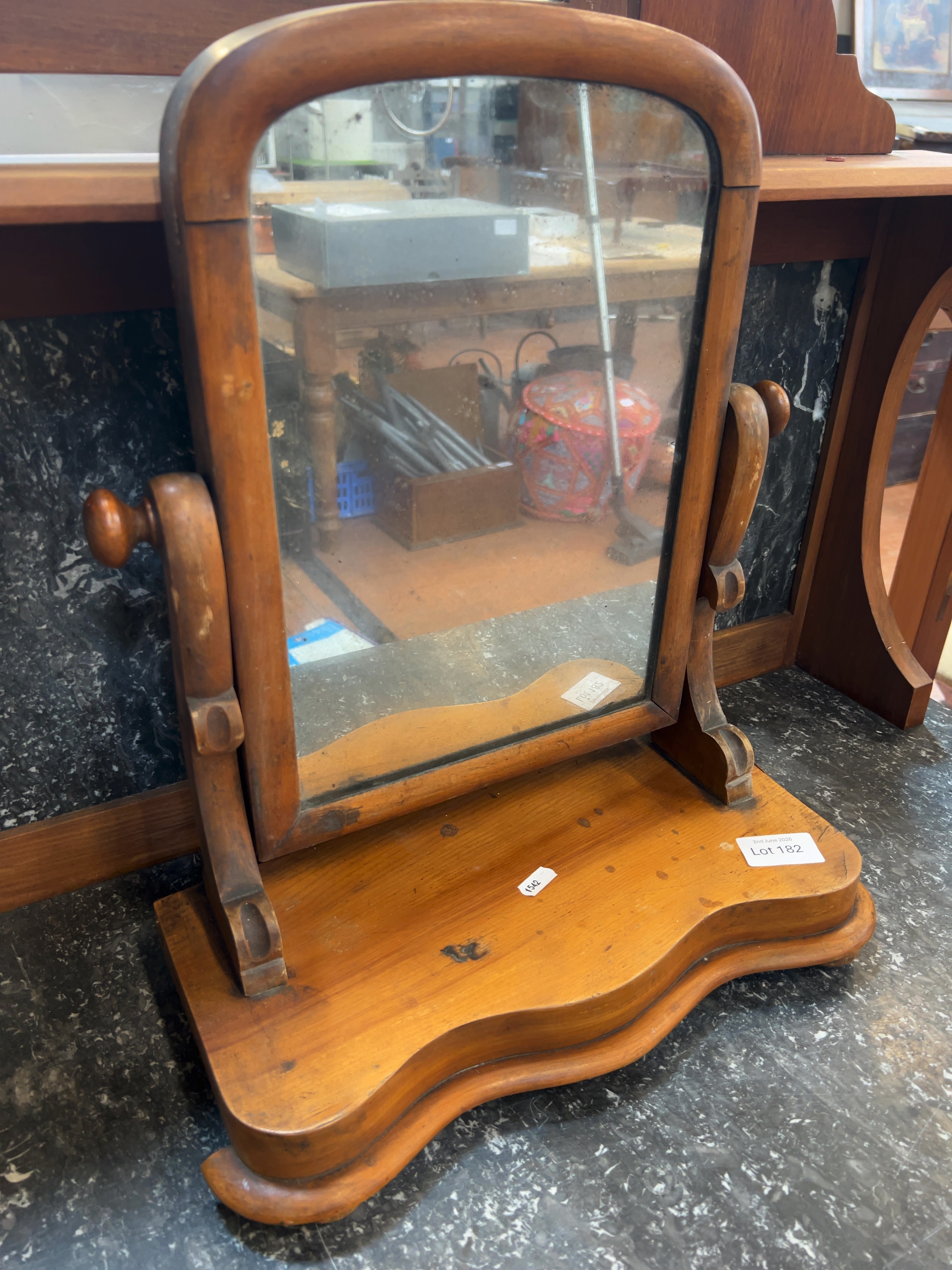 A late Victorian mahogany dressing table swing mirror