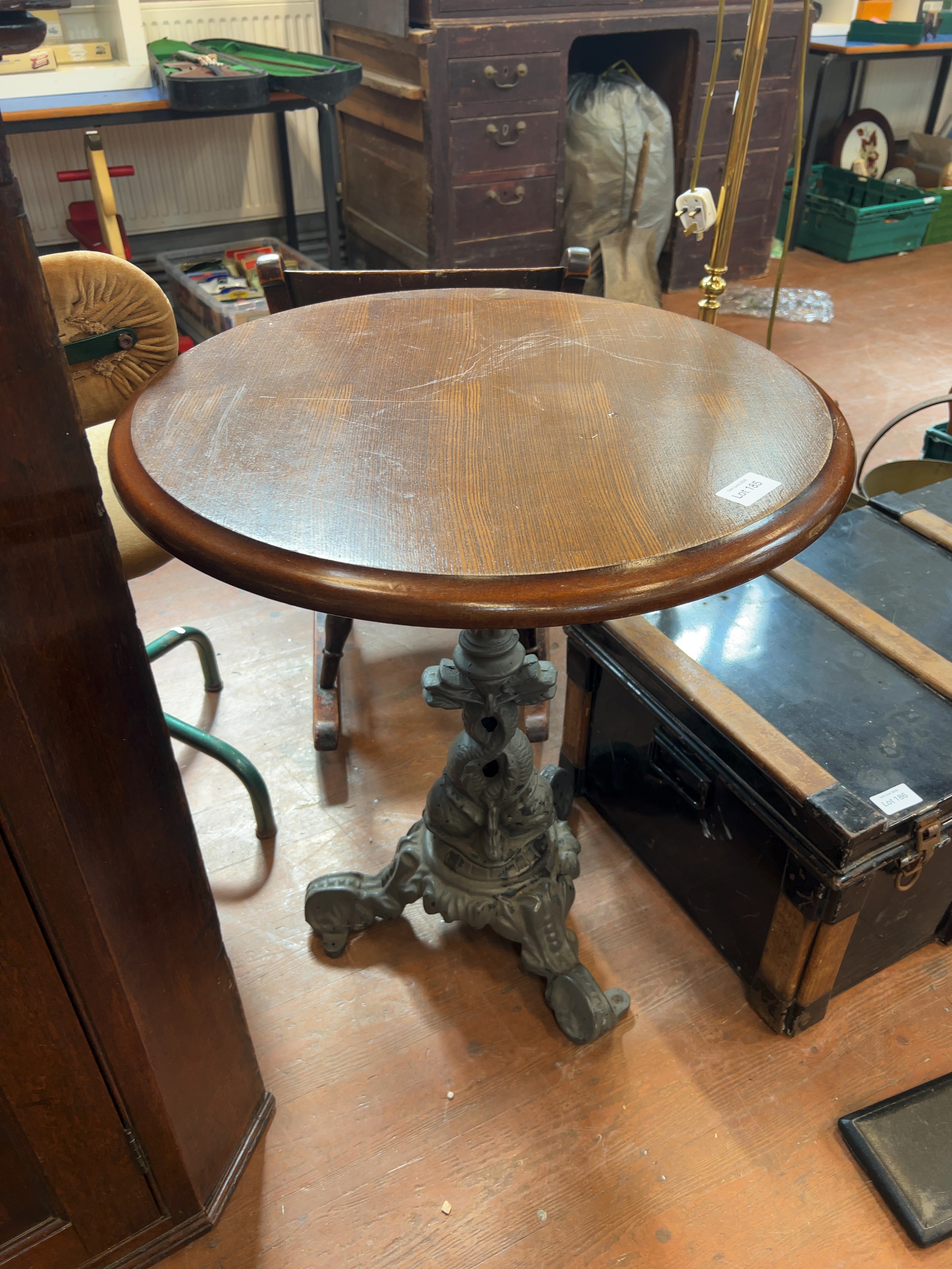 A Victorian Style Cast Iron and Oak Pub Table