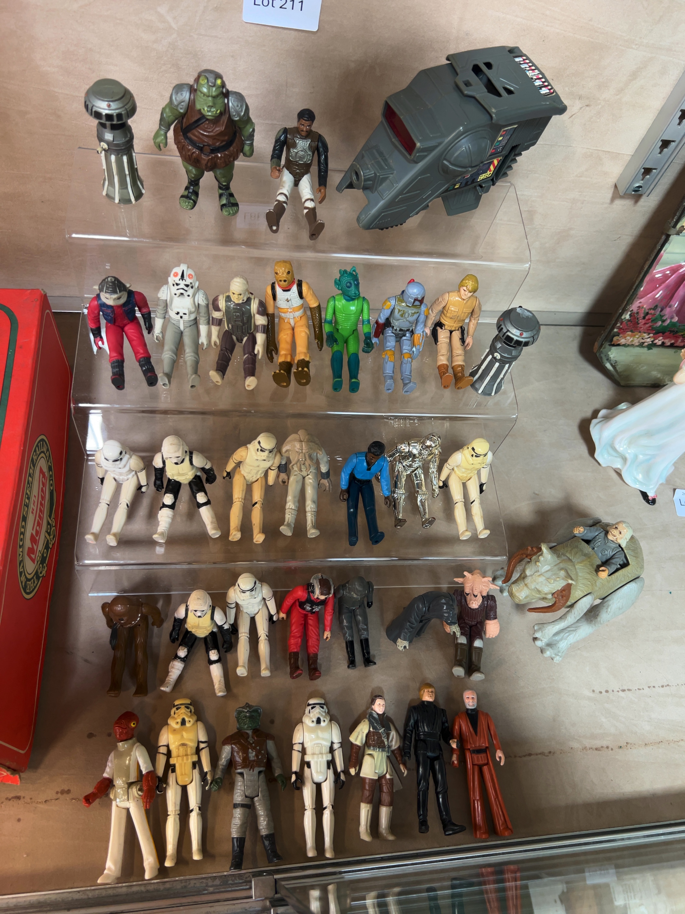 A Collection of Vintage Kenner Star Wars Action Figures and INT-4 Interceptor Vehicle