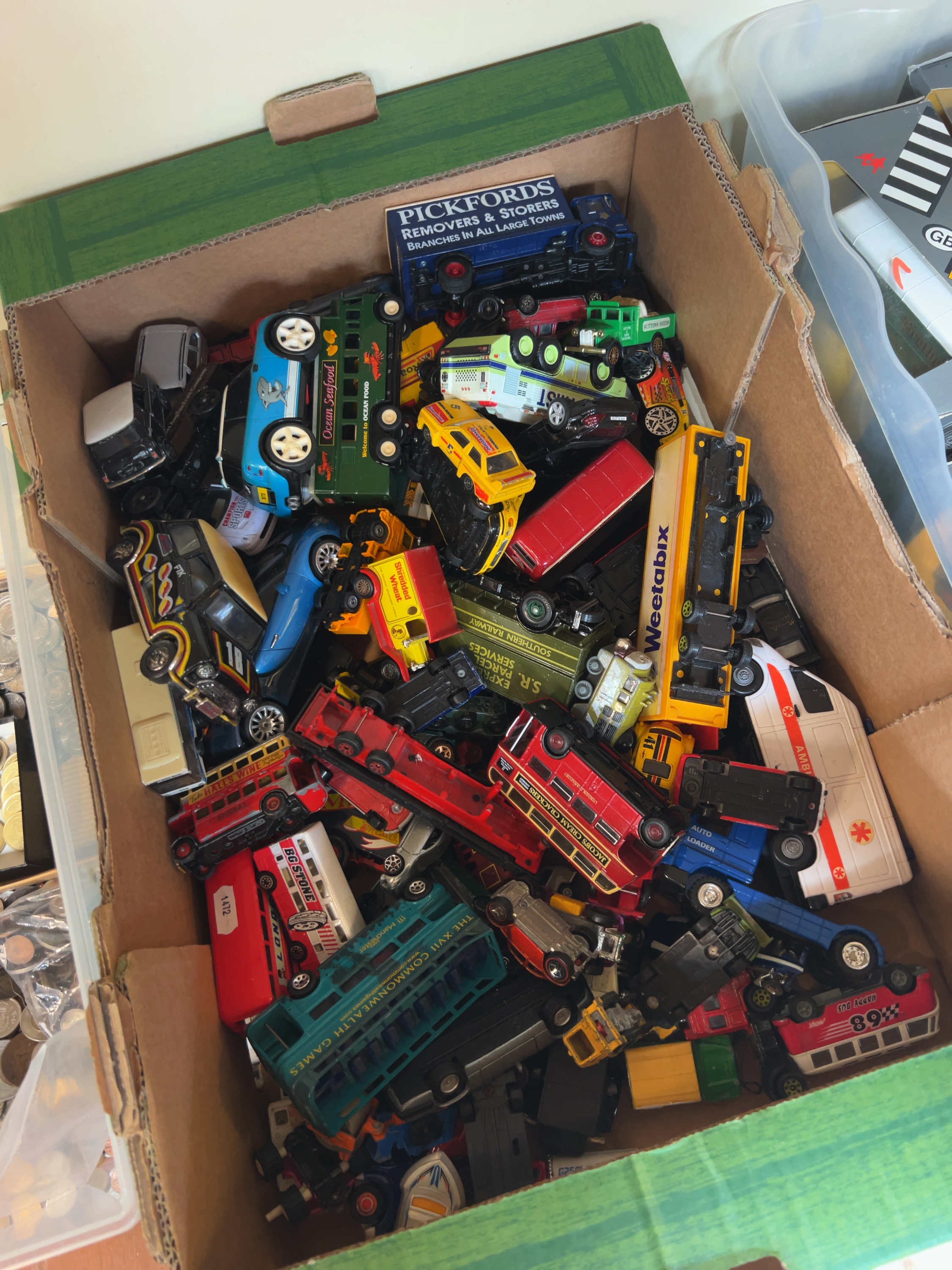 A Collection of Die-cast and Plastic Toy Vehicles including Buses and Commercial Lorries