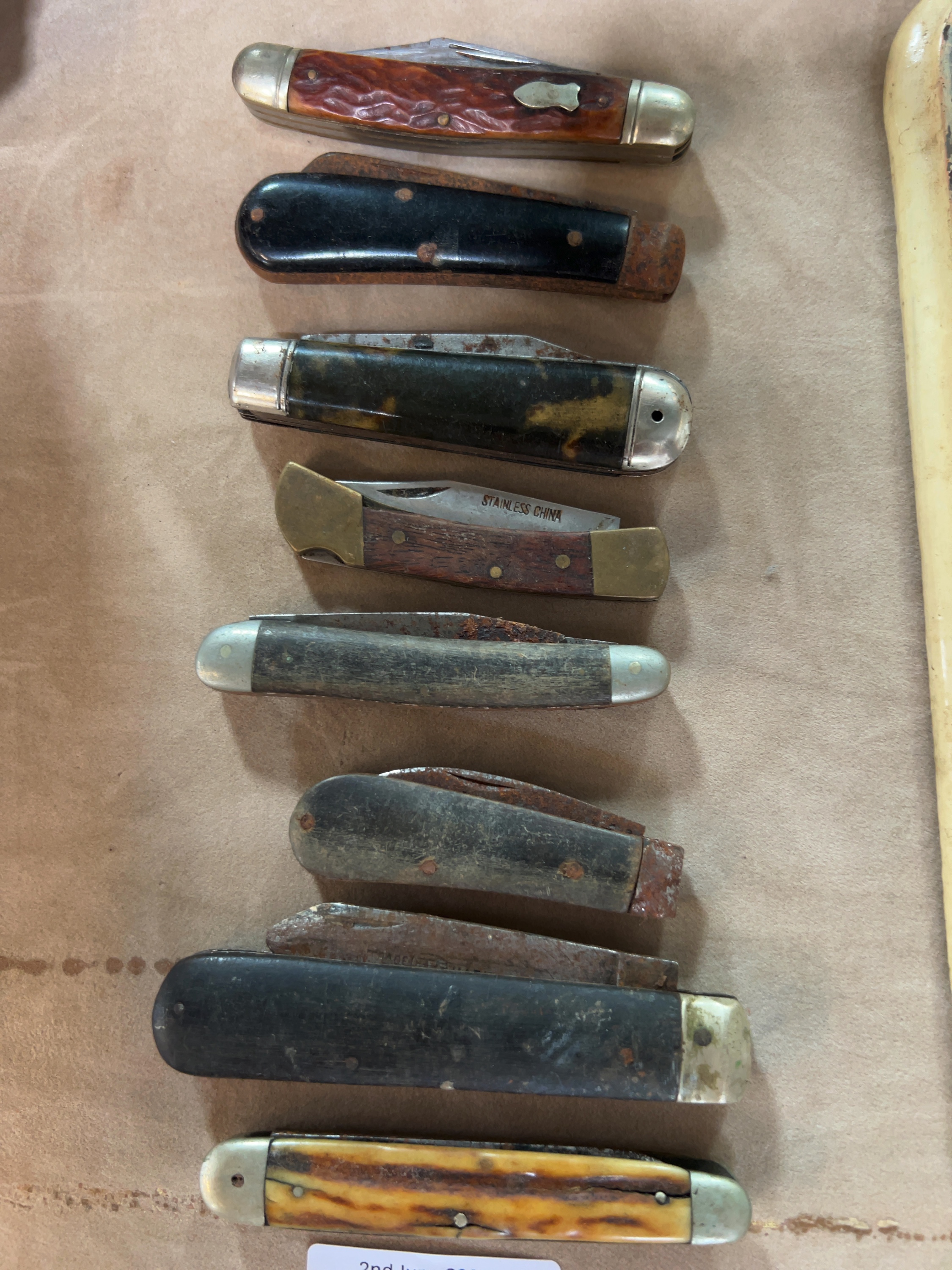 An Assortment of Eight Vintage and Modern Folding Pocket Knives