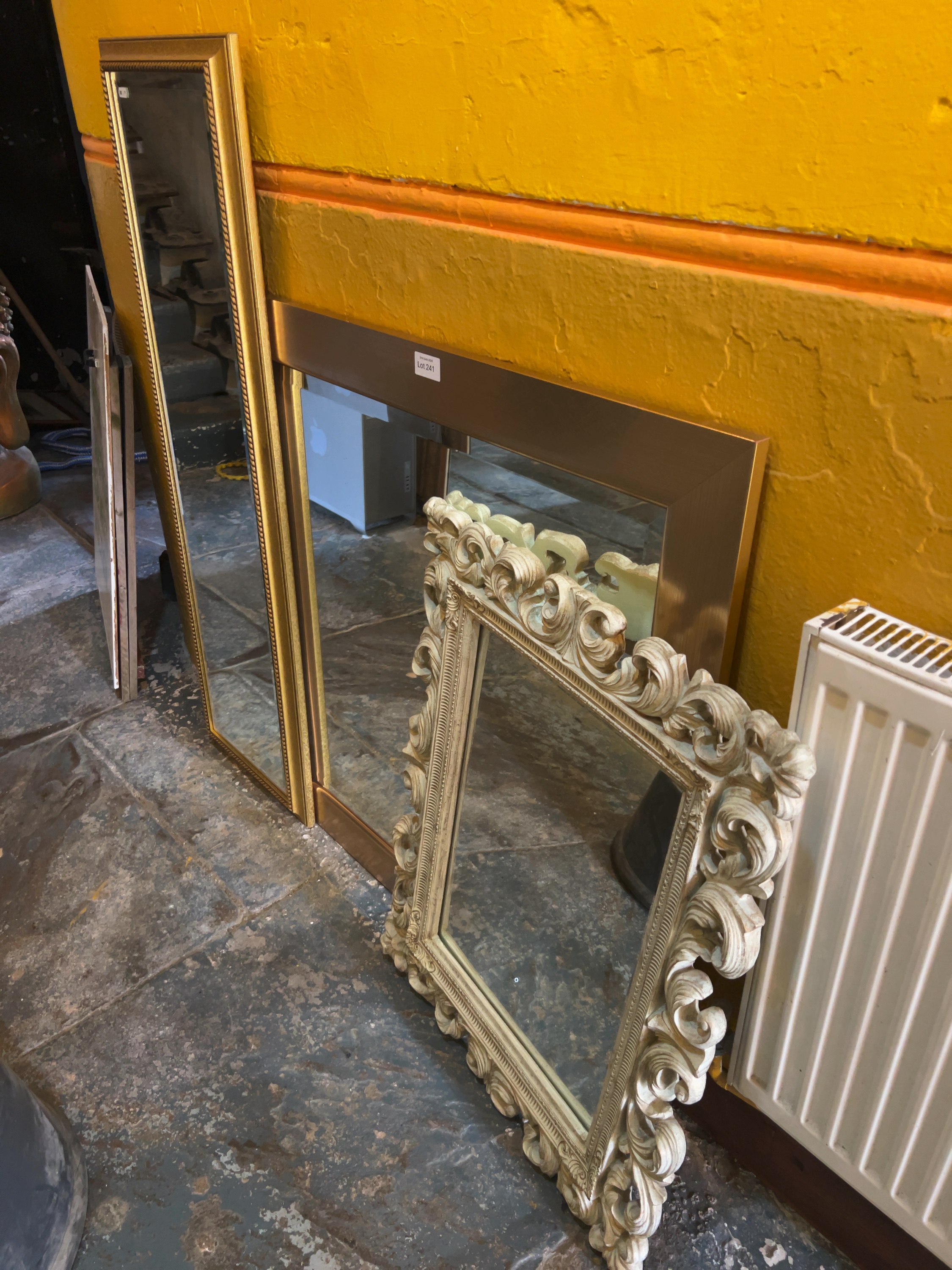 A Trio of Assorted Decorative Wall Mirrors