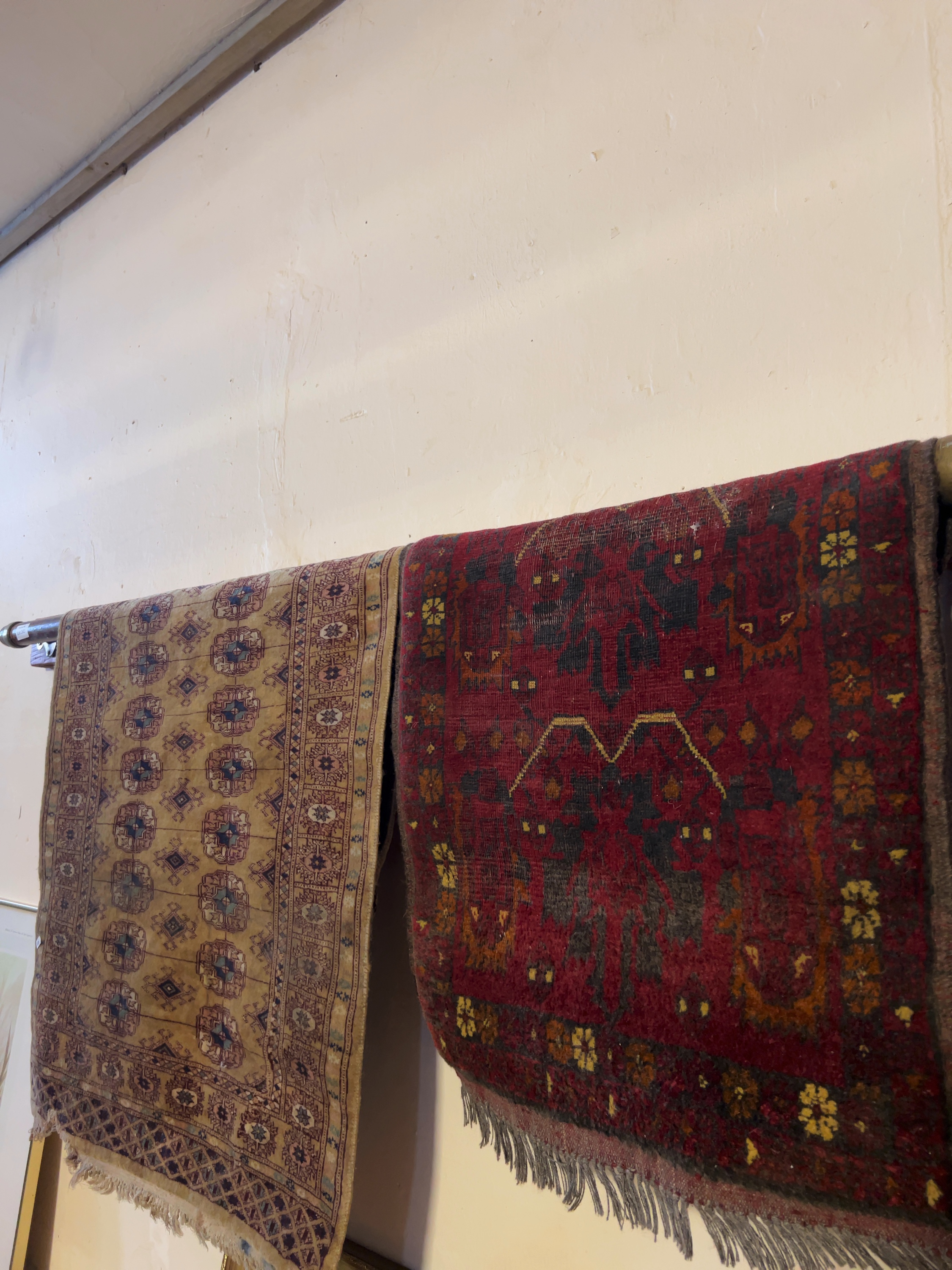 Two Hand-Knotted Oriental Rugs including a Turkoman Style Bokhara and an Afghan Tribal Rug