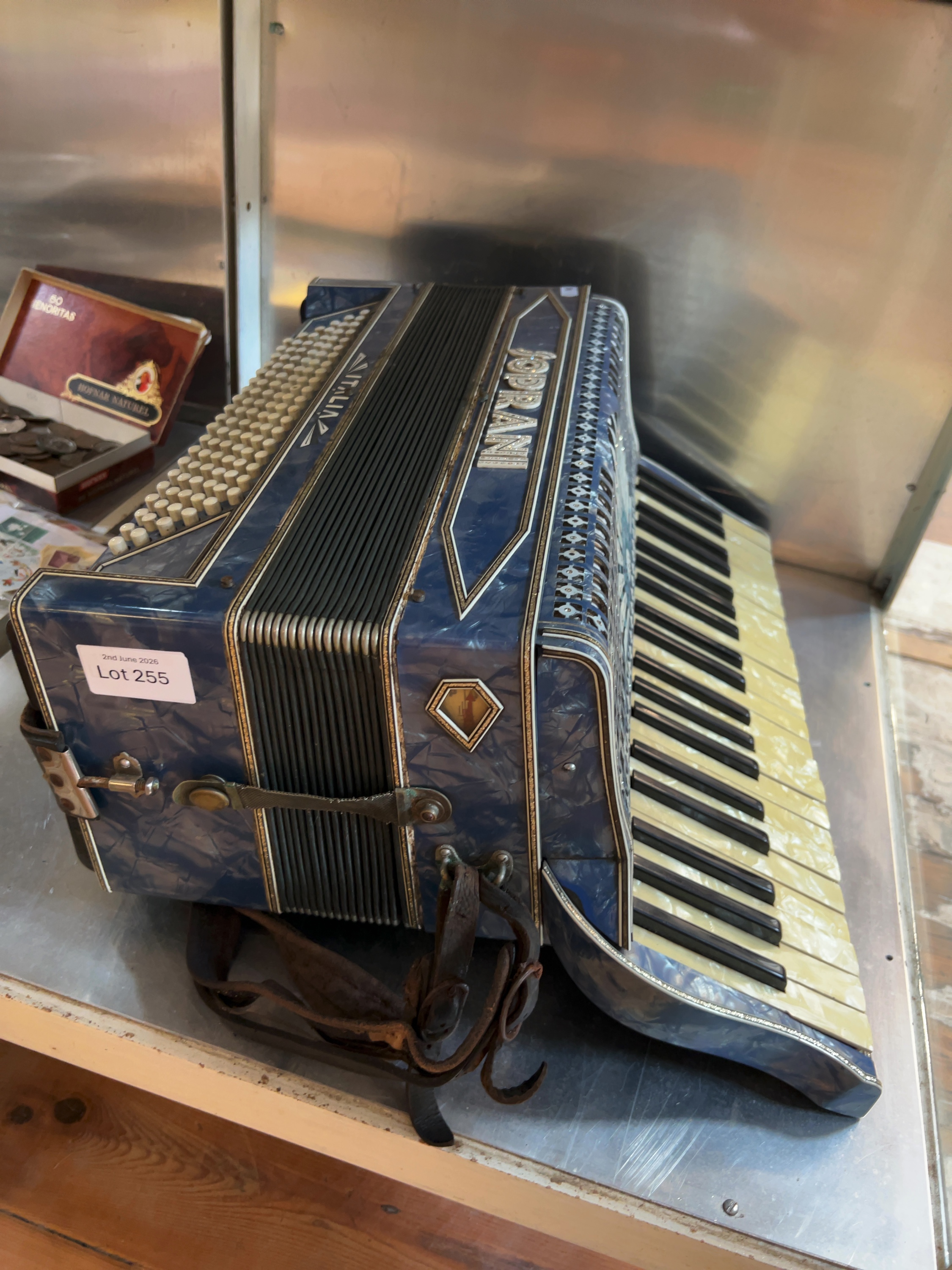 A mid-20th century Soprani Italia piano accordion