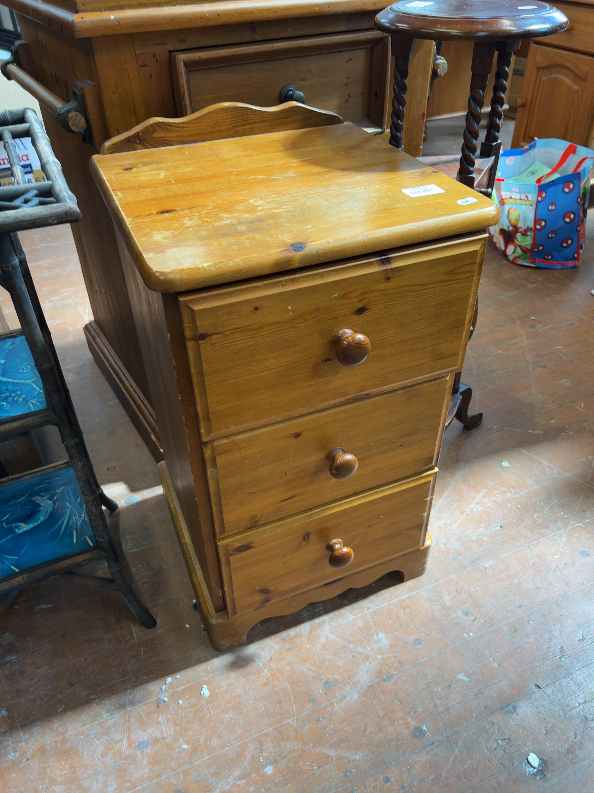 Late 20th century pine bedside chest of three drawers