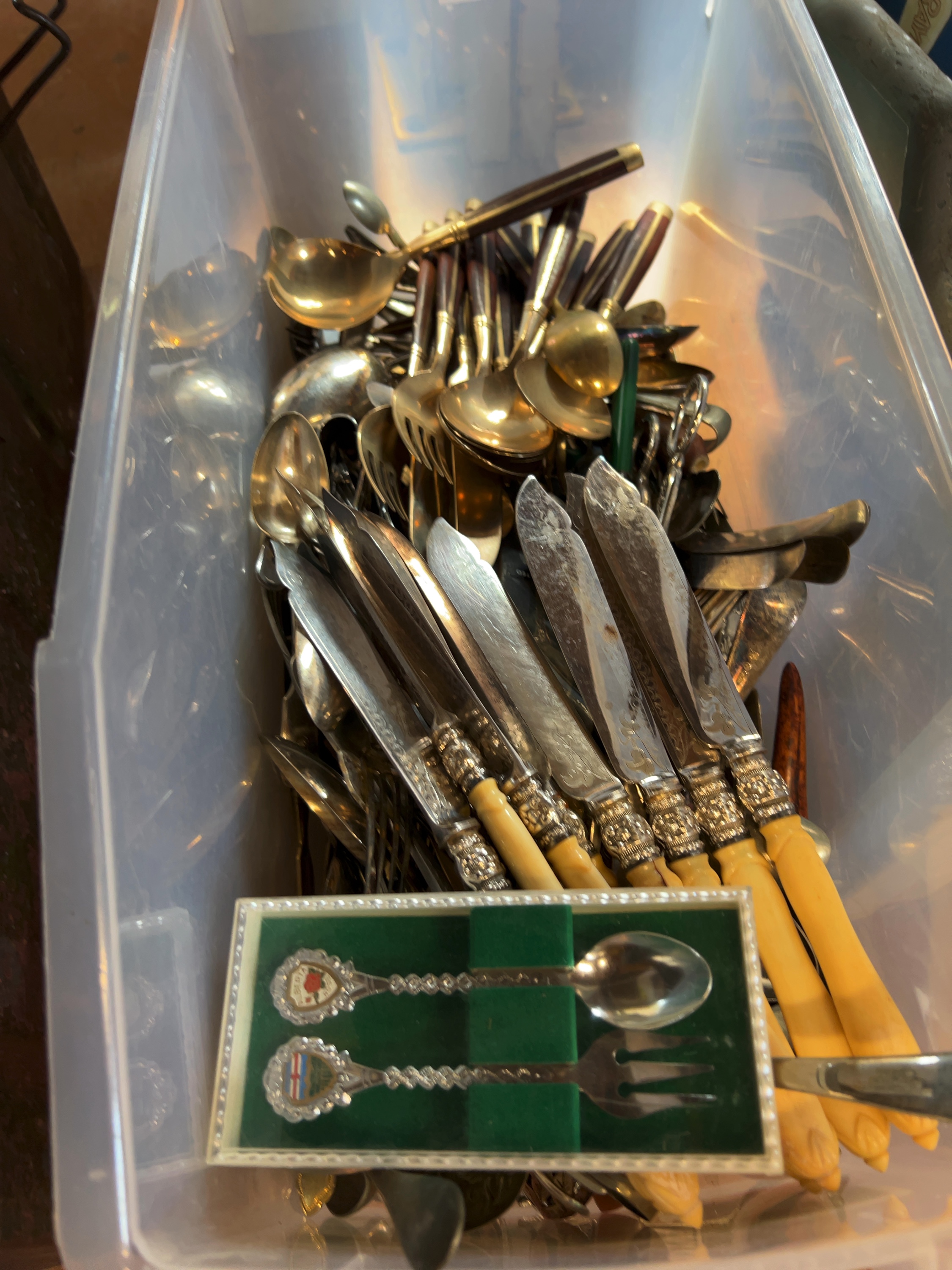 An Assortment of Boxed and Loose Flatware, Including Thai-Style Brass and Stainless Steel Sets