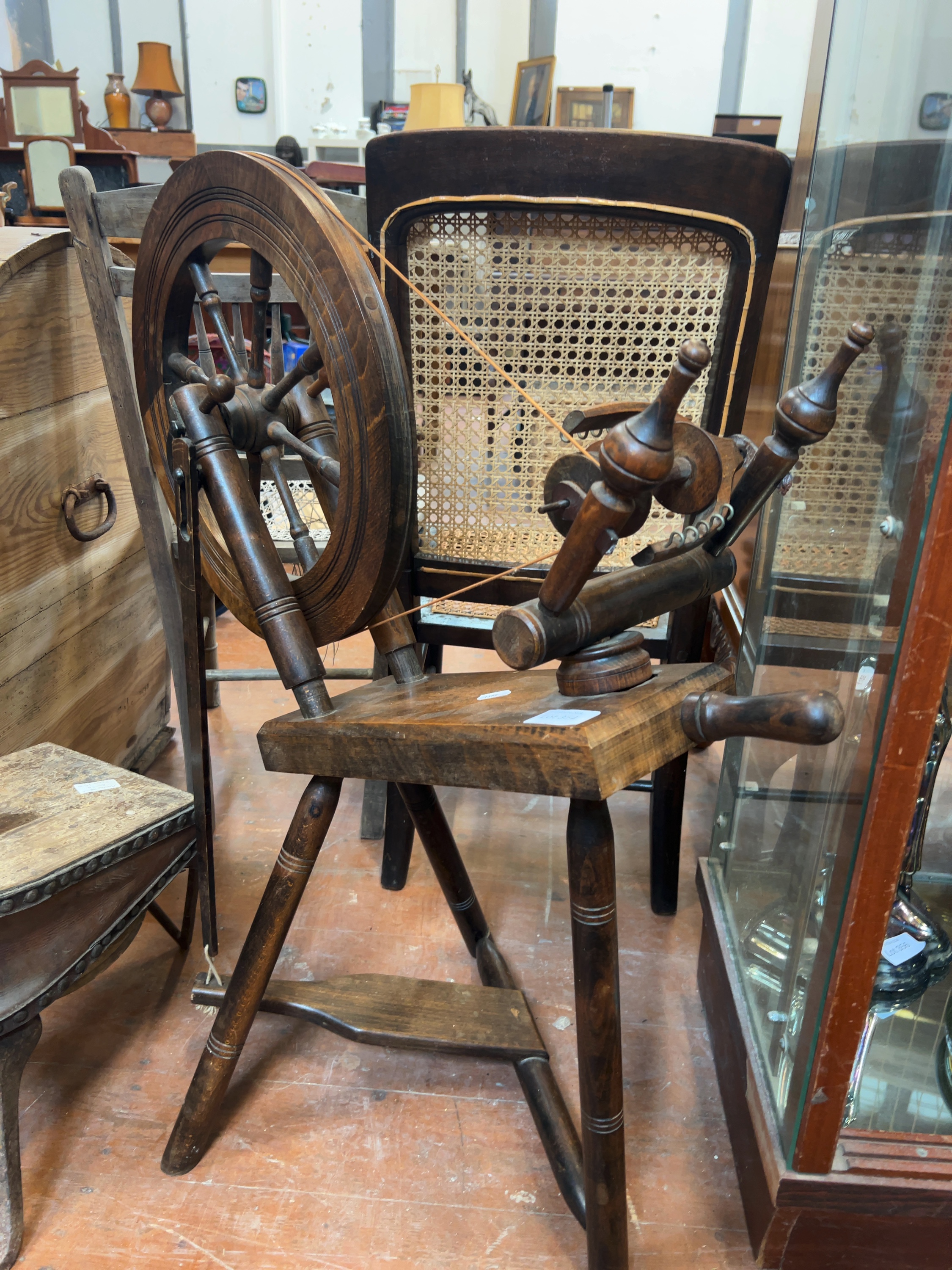 An Antique 19th Century Stained Hardwood Saxony Style Spinning Wheel