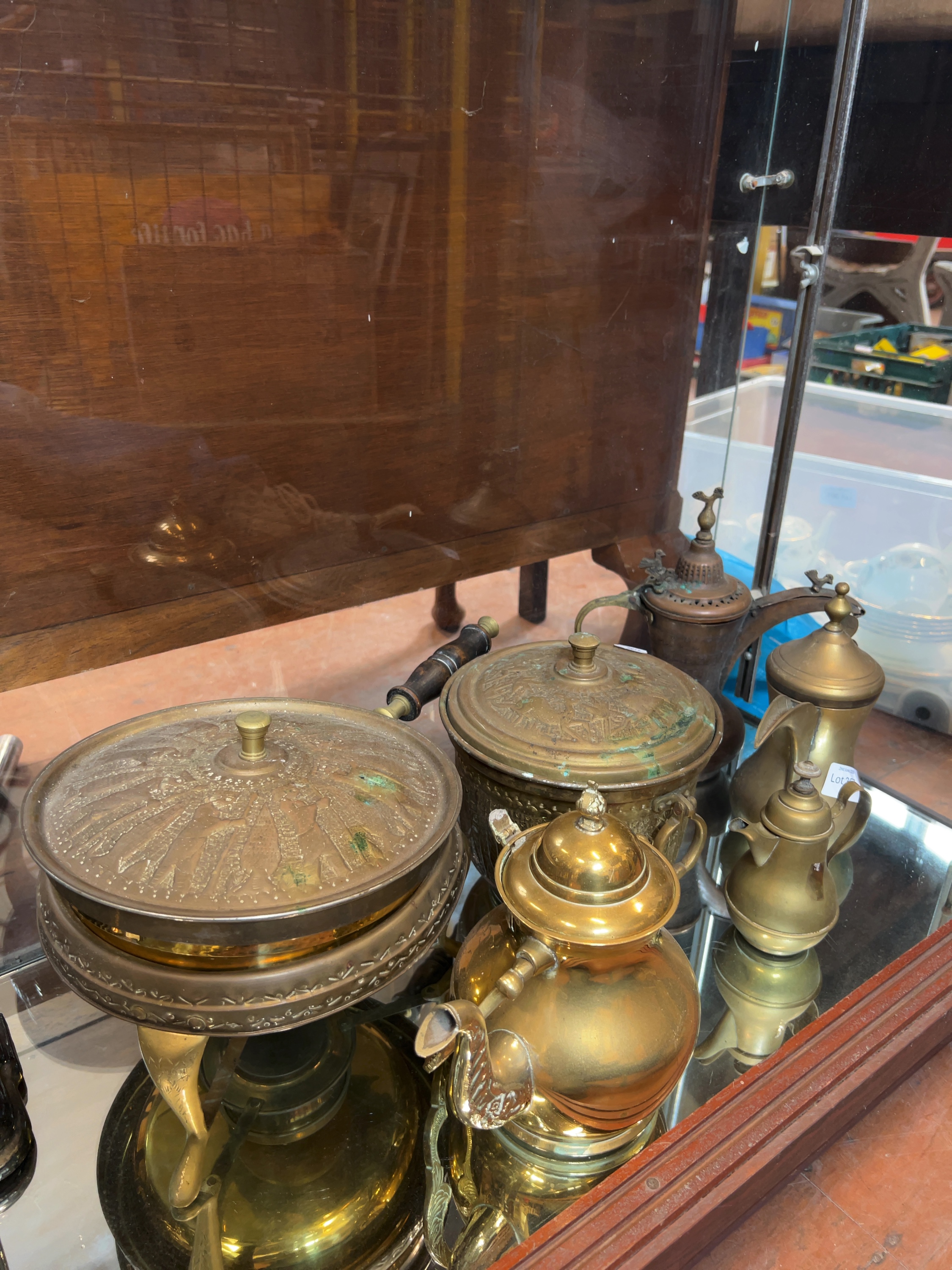 An Assortment of Middle Eastern and Islamic Brass and Copper Metalware