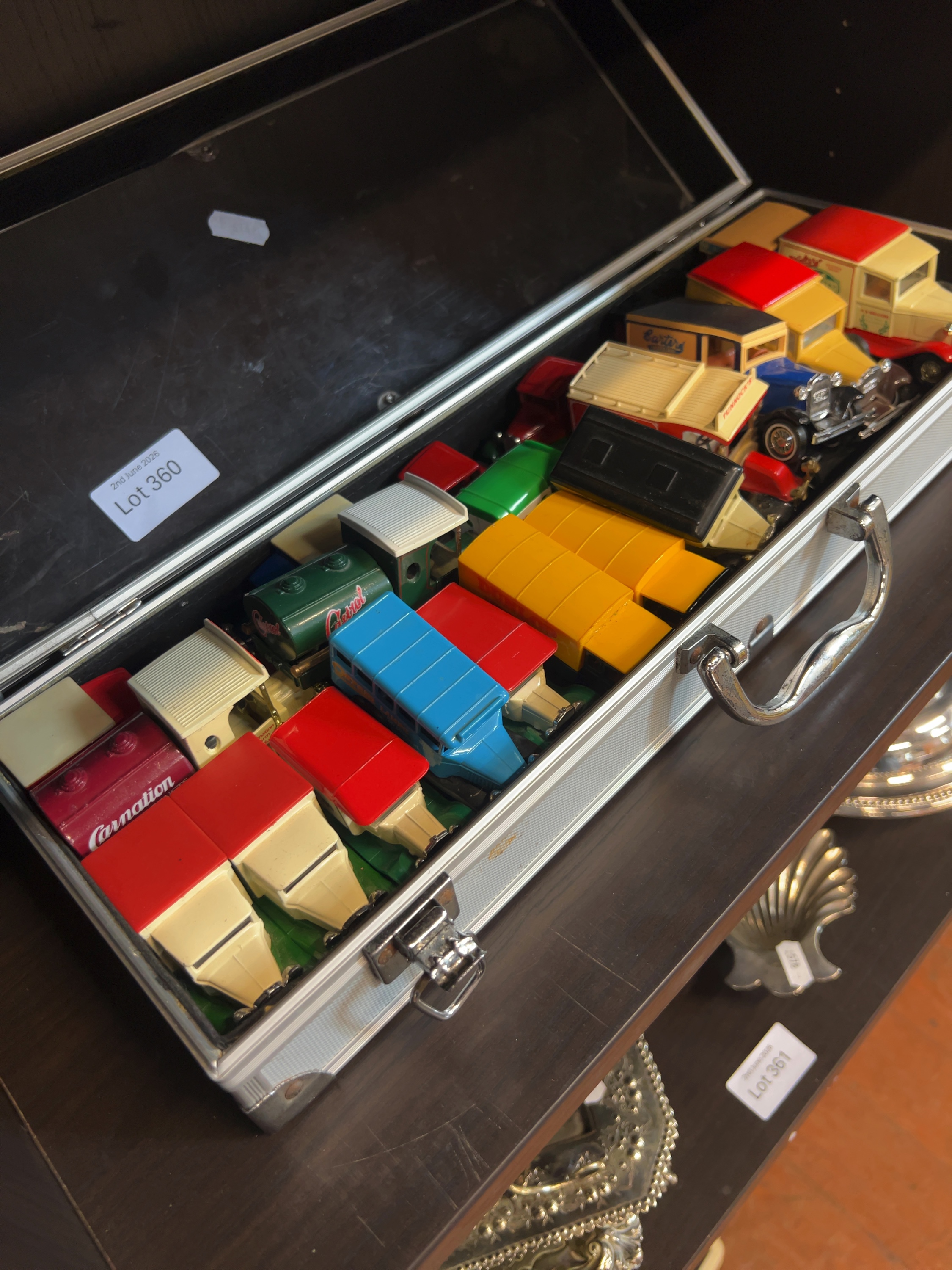 A Collection of Approximately Twenty Model Commercial Vehicles in a Carry Case