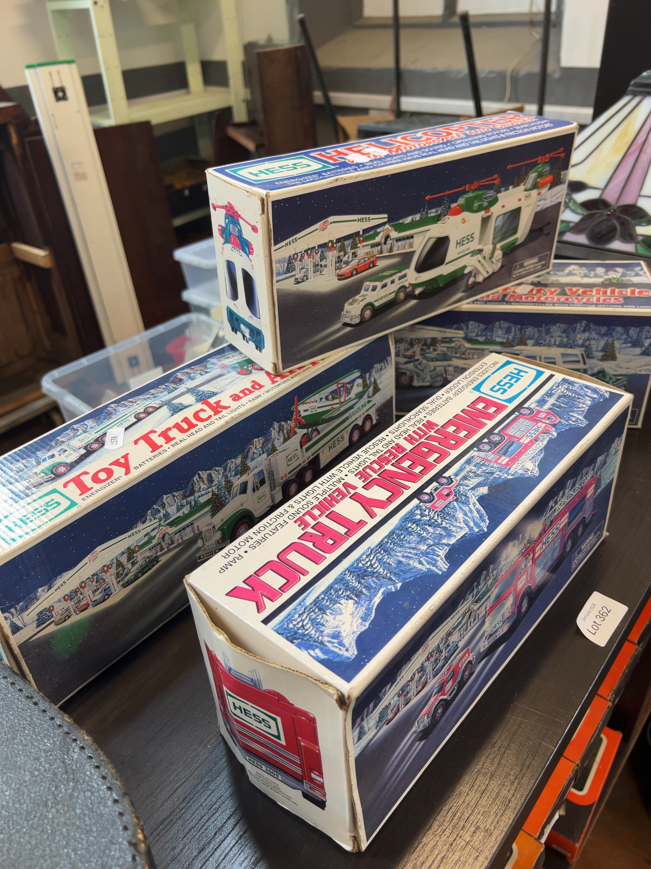 A Collection of Four Boxed Hess Toy Vehicles