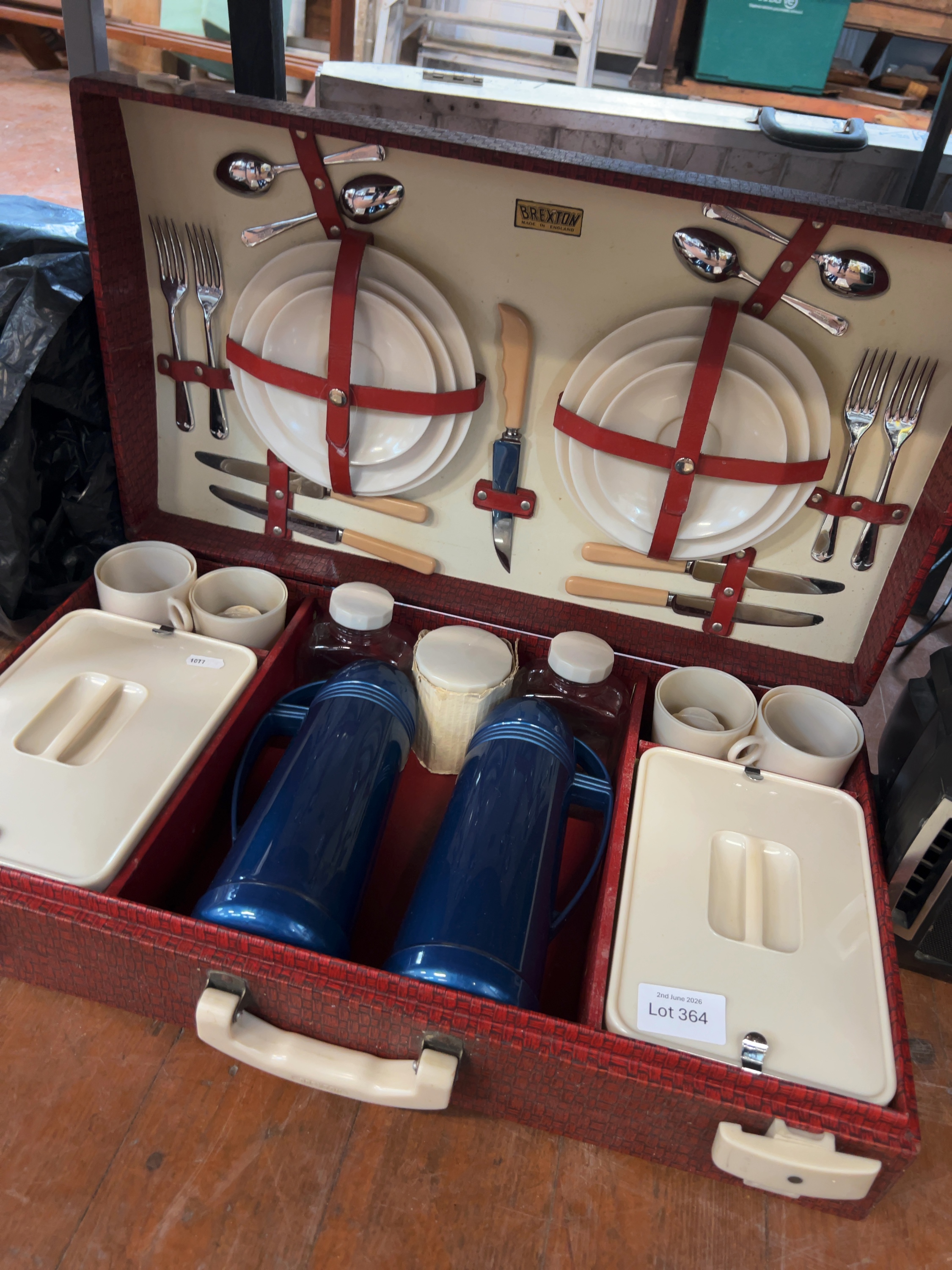 A Mid-20th Century Brexton Picnic Set for Four in a Red Basketweave Case