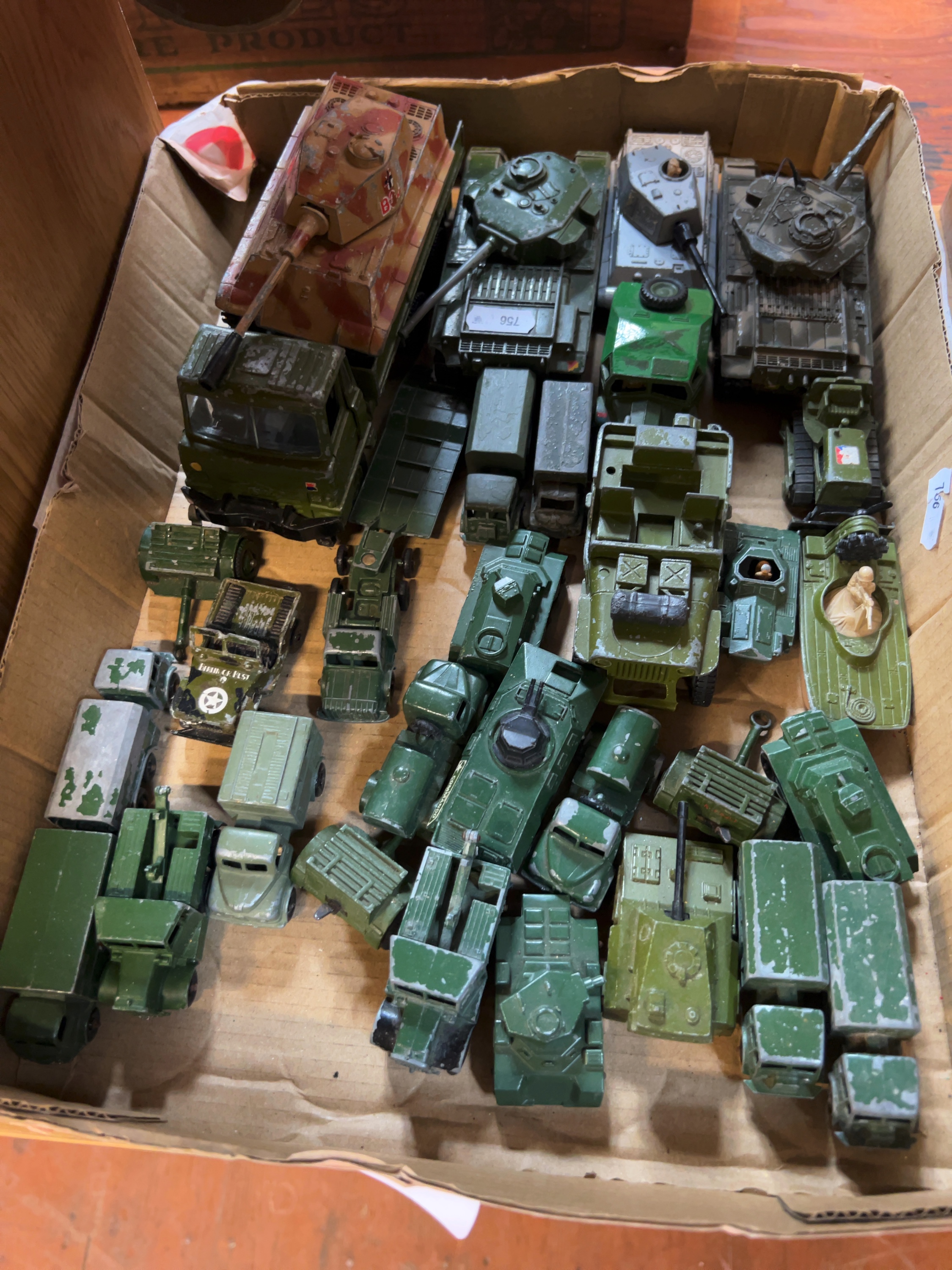 A Collection of 35 Vintage Die-cast Military Vehicles and Equipment