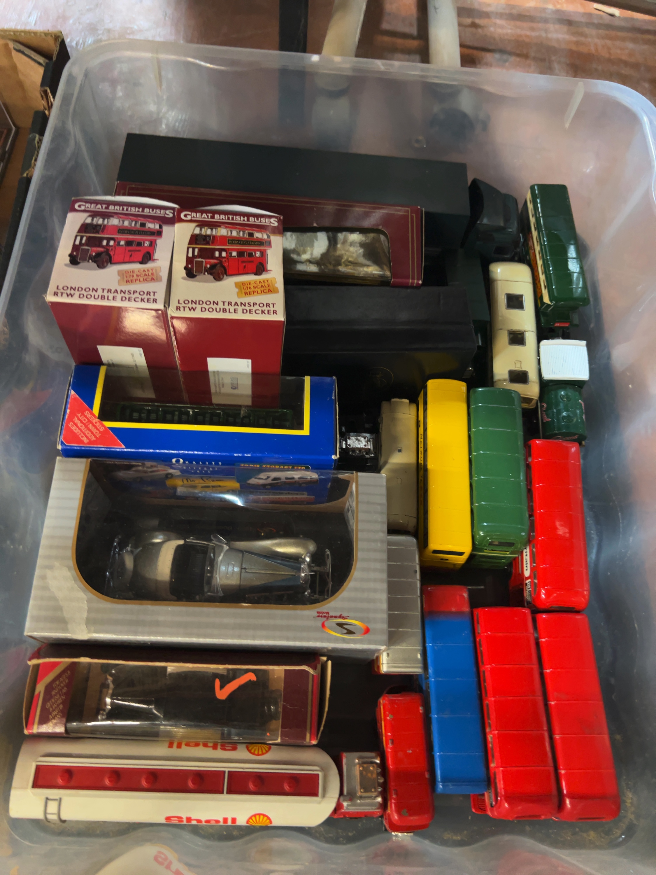 A Collection of approximately 25 Model Buses and Commercial Vehicles including Corgi and Atlas Editions