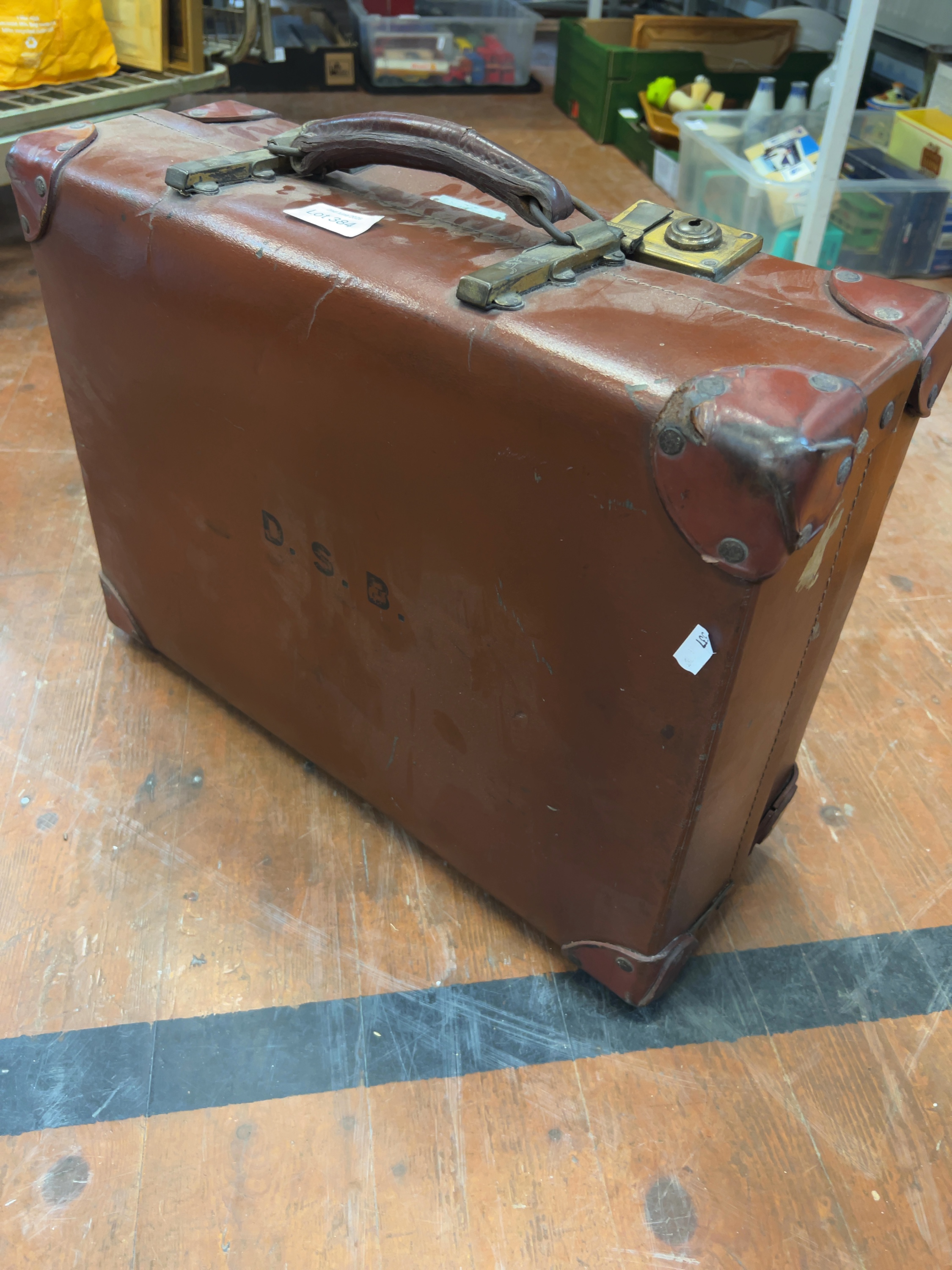 A mid-20th century Revelation brown leather suitcase with removable inner tray