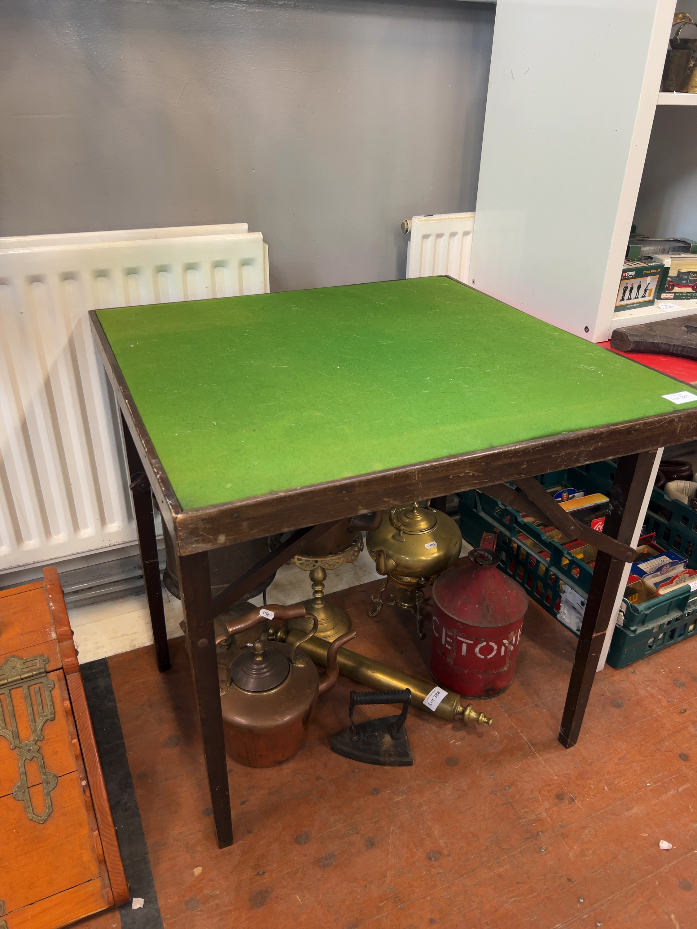 A mid-20th century British folding card table