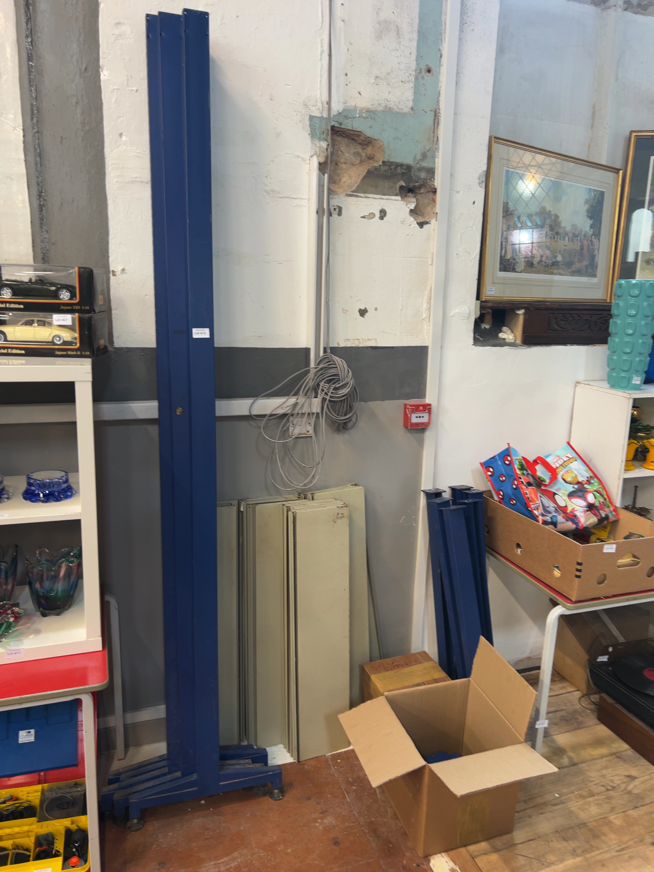 A Collection of Dismantled Commercial Metal Shelving and Racking Components