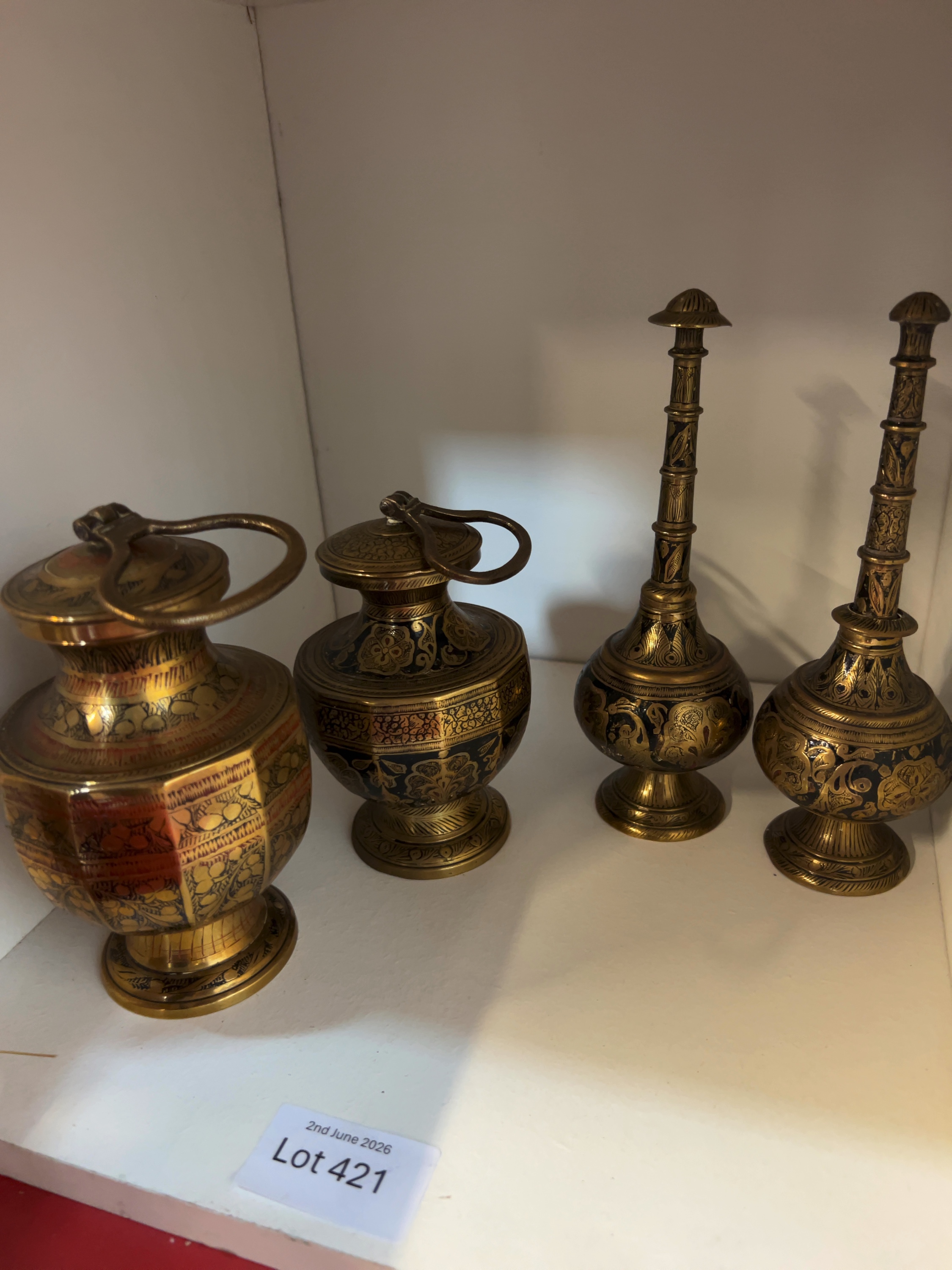 A Set of Four Indian Etched and Lacquered Brass Vessels