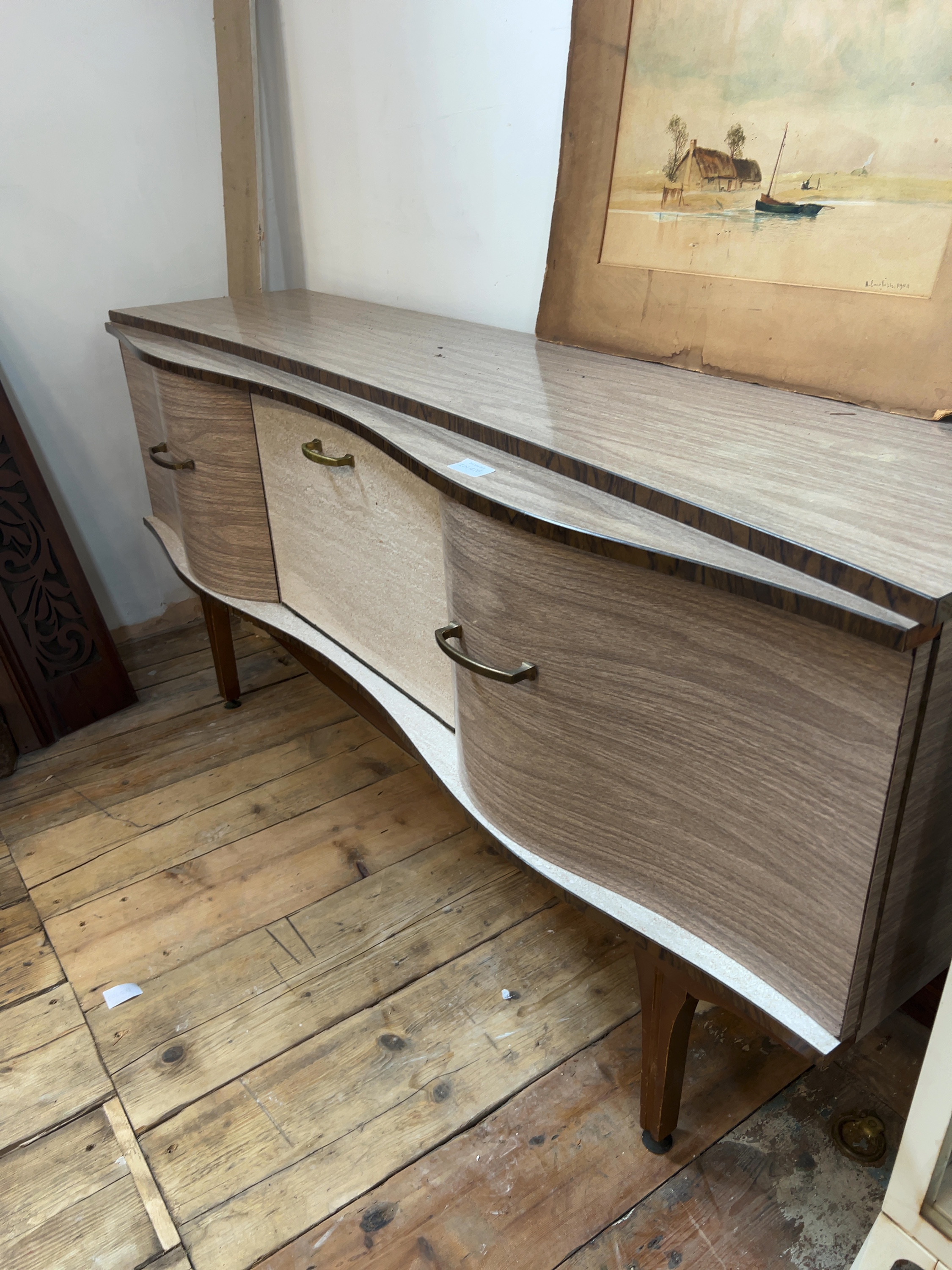 Mid-century modern bow-front laminate sideboard and cocktail cabinet