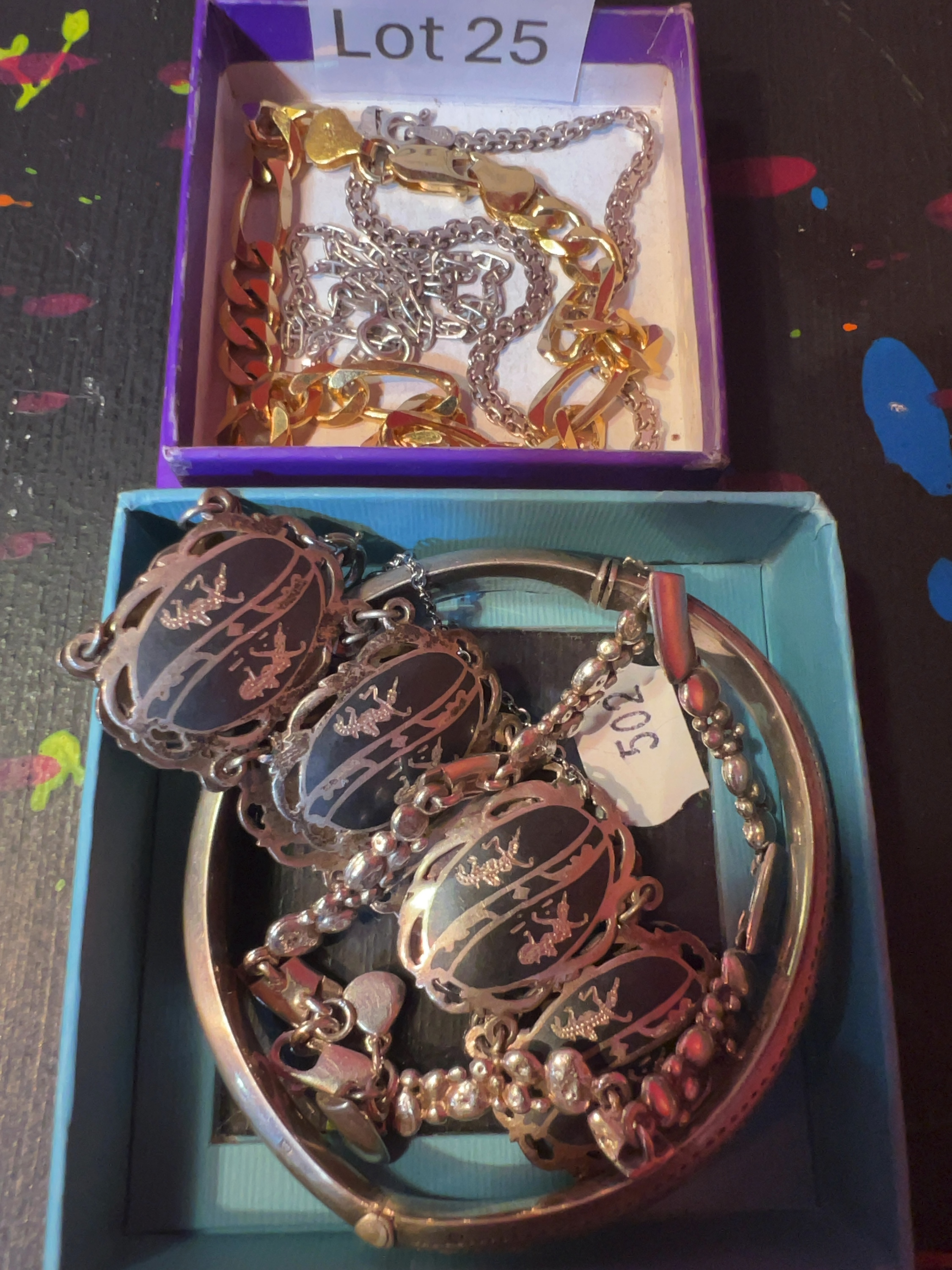 Assortment of Silver and Silver-Gilt Jewellery including a Siam Sterling Niello Bracelet