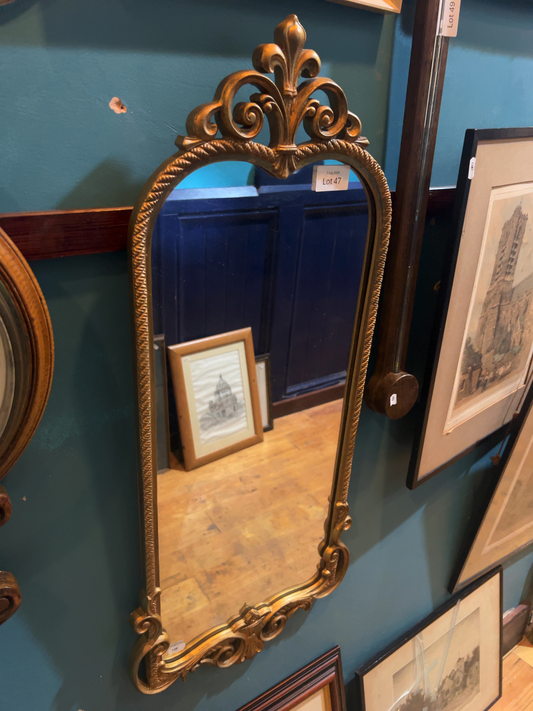 A Late 19th or Early 20th-Century Rococo Revival Giltwood and Composition Wall Mirror