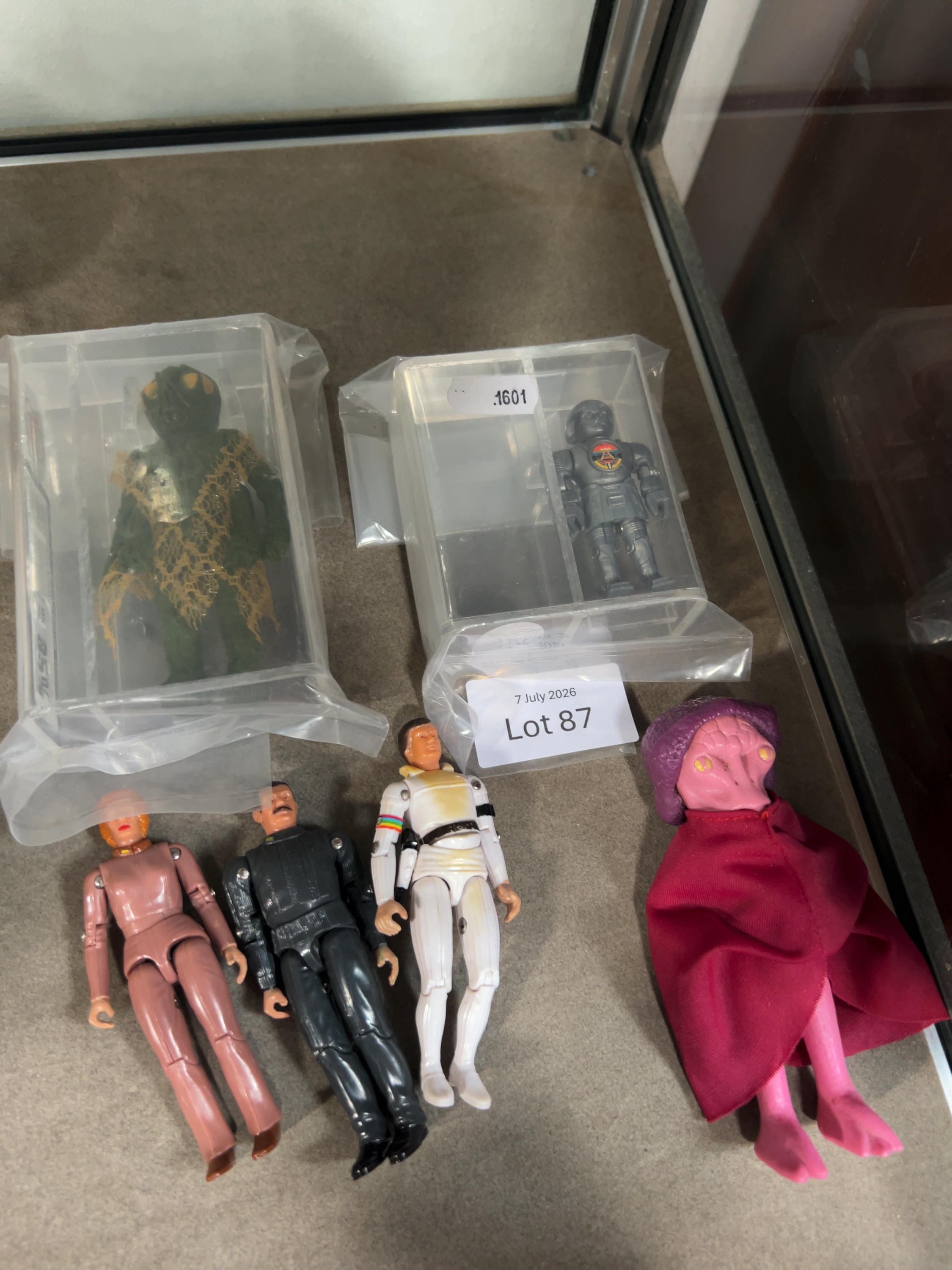 Six Vintage Science Fiction Action Figures including Mattel Battlestar Galactica Boray AFA 85 and Mego Buck Rogers Twiki AFA 90
