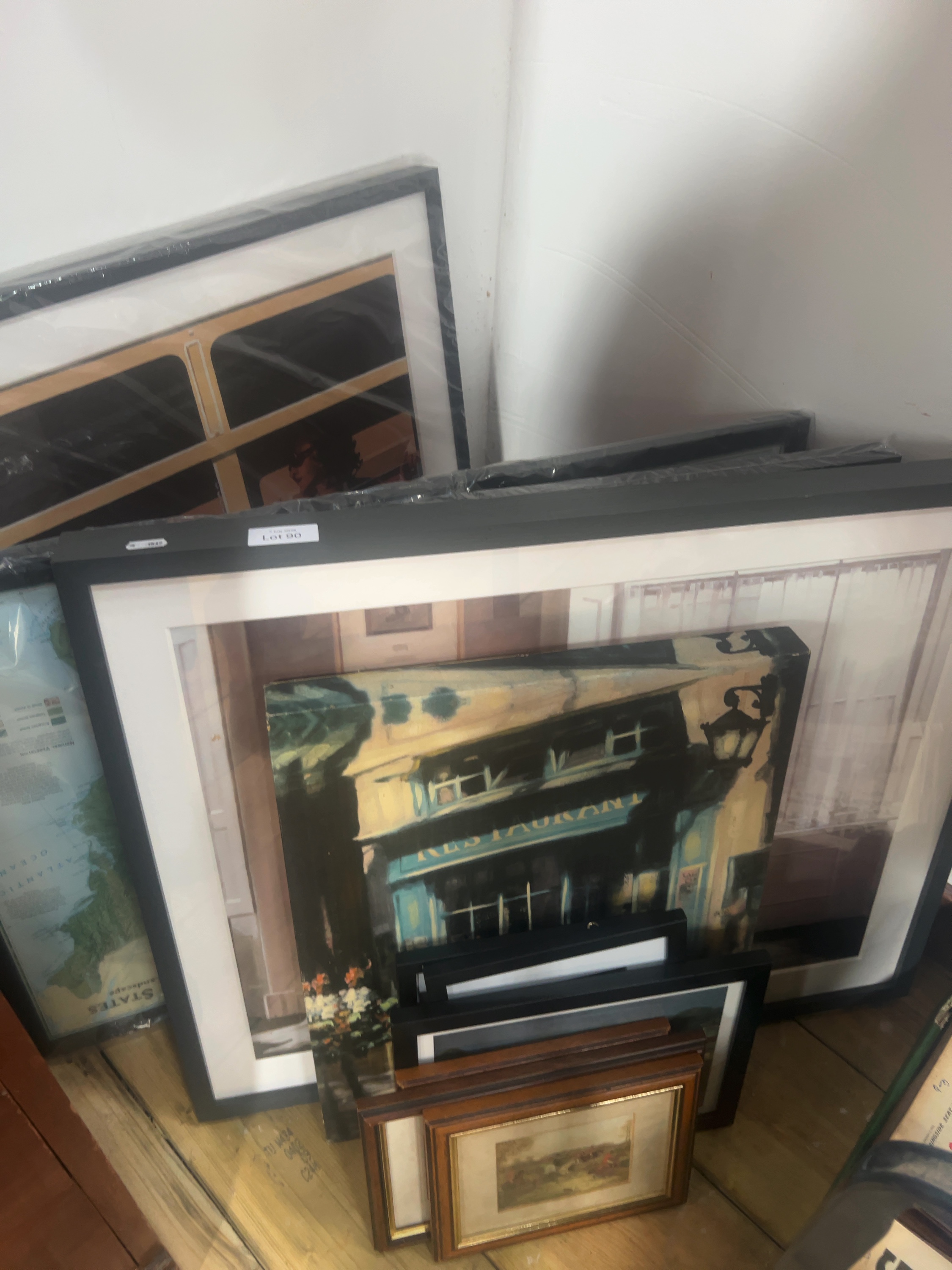 A Collection of Framed Decorative Prints and Artworks including Cinematic, Street Scene, and Map Subjects
