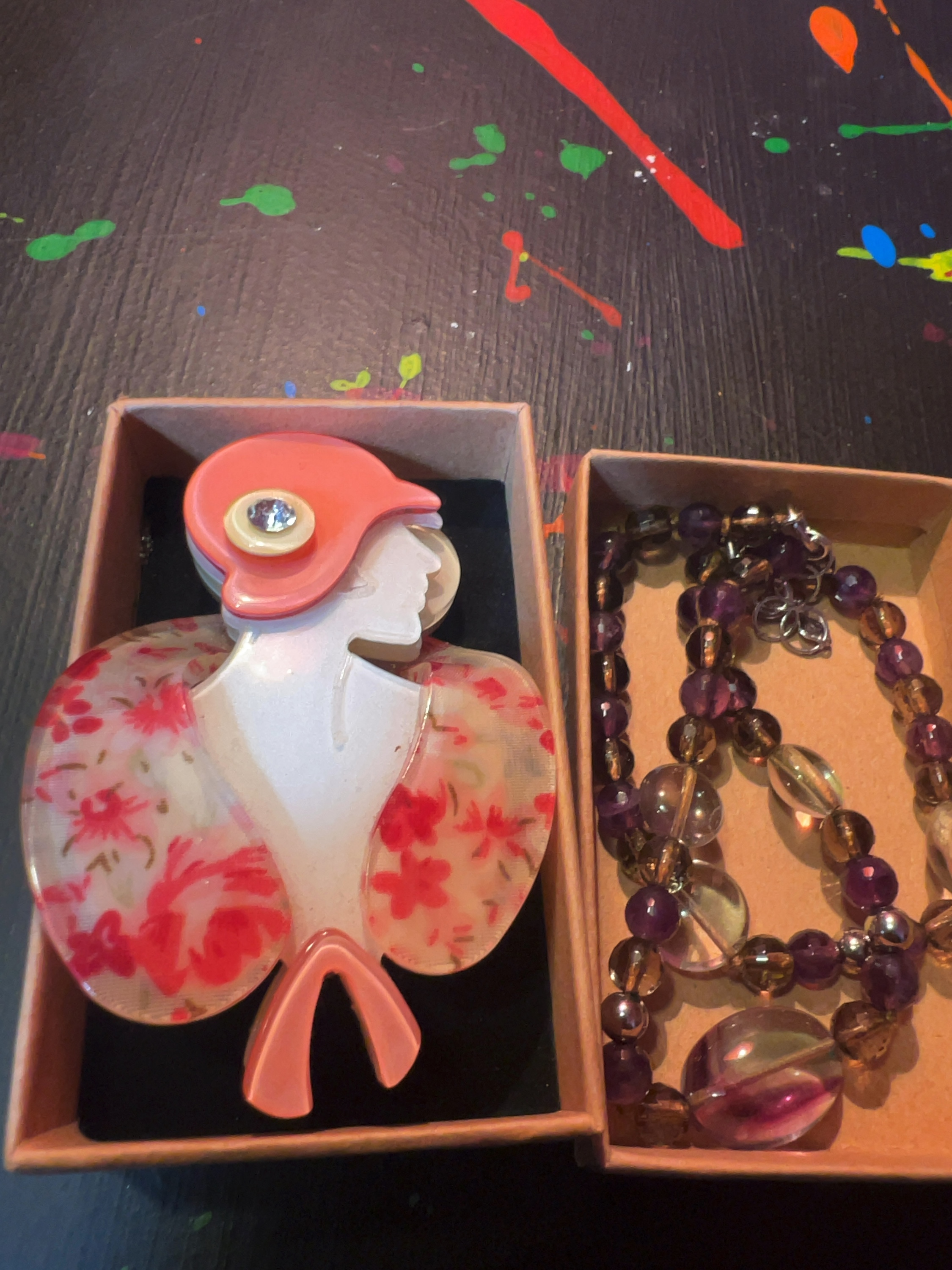 Two Pieces of Jewellery Comprising a Figural Acrylic Brooch and a Sterling Silver Mounted Ametrine and Amethyst Necklace