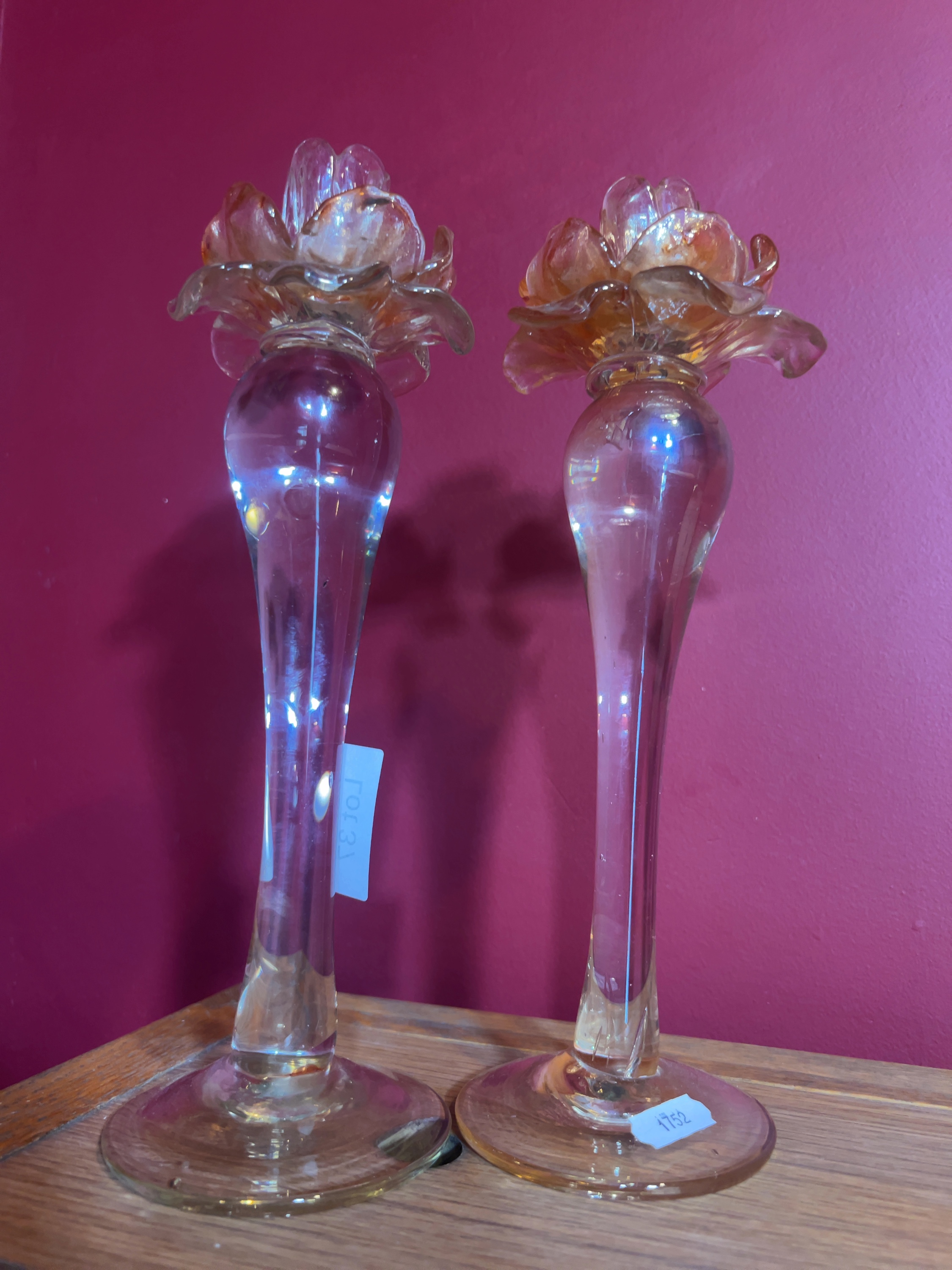 Two Venetian-style Iridescent Amber and Clear Glass Flower Pedestal Candlesticks